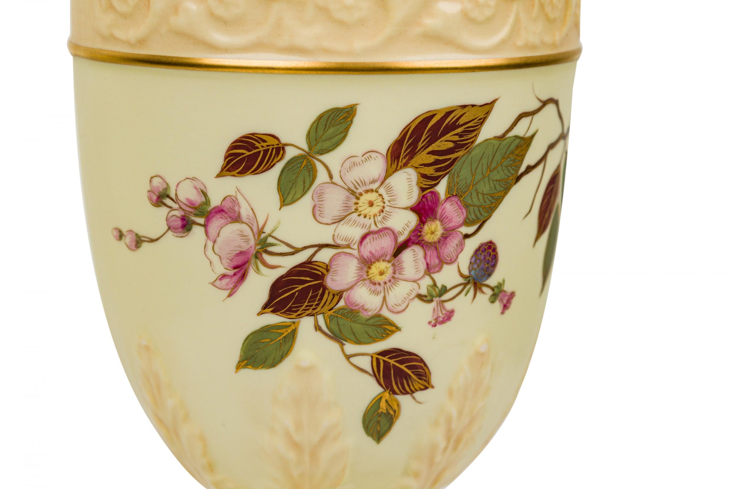 English Victorian style Mid-Century table lamp with a white ceramic urn-form body with painted floral designs, resting on a square base and mounted with brass hardware.(Similar lamps: 063348)

Condition: Good; Wear consistent with age and use