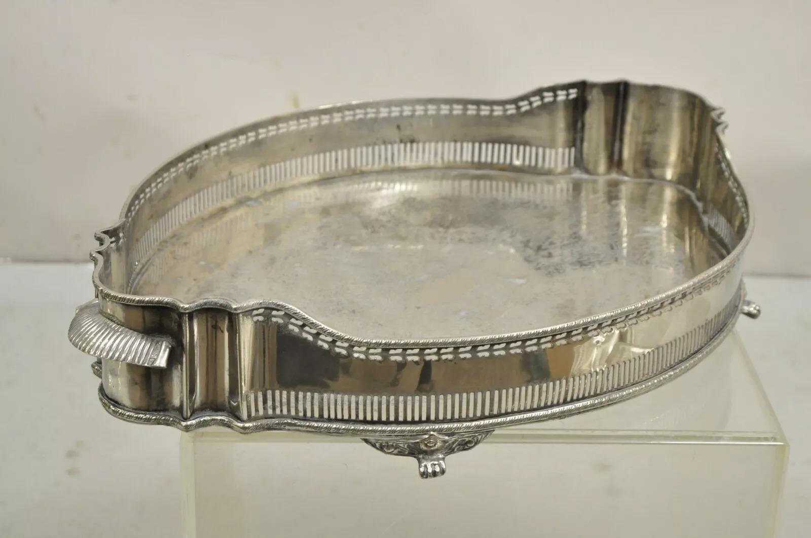 Contemporary English Victorian Style Oval Raised Gallery Silver Plated Centerpiece Tray. Circa Late 20th Century. Measurements: 4.5