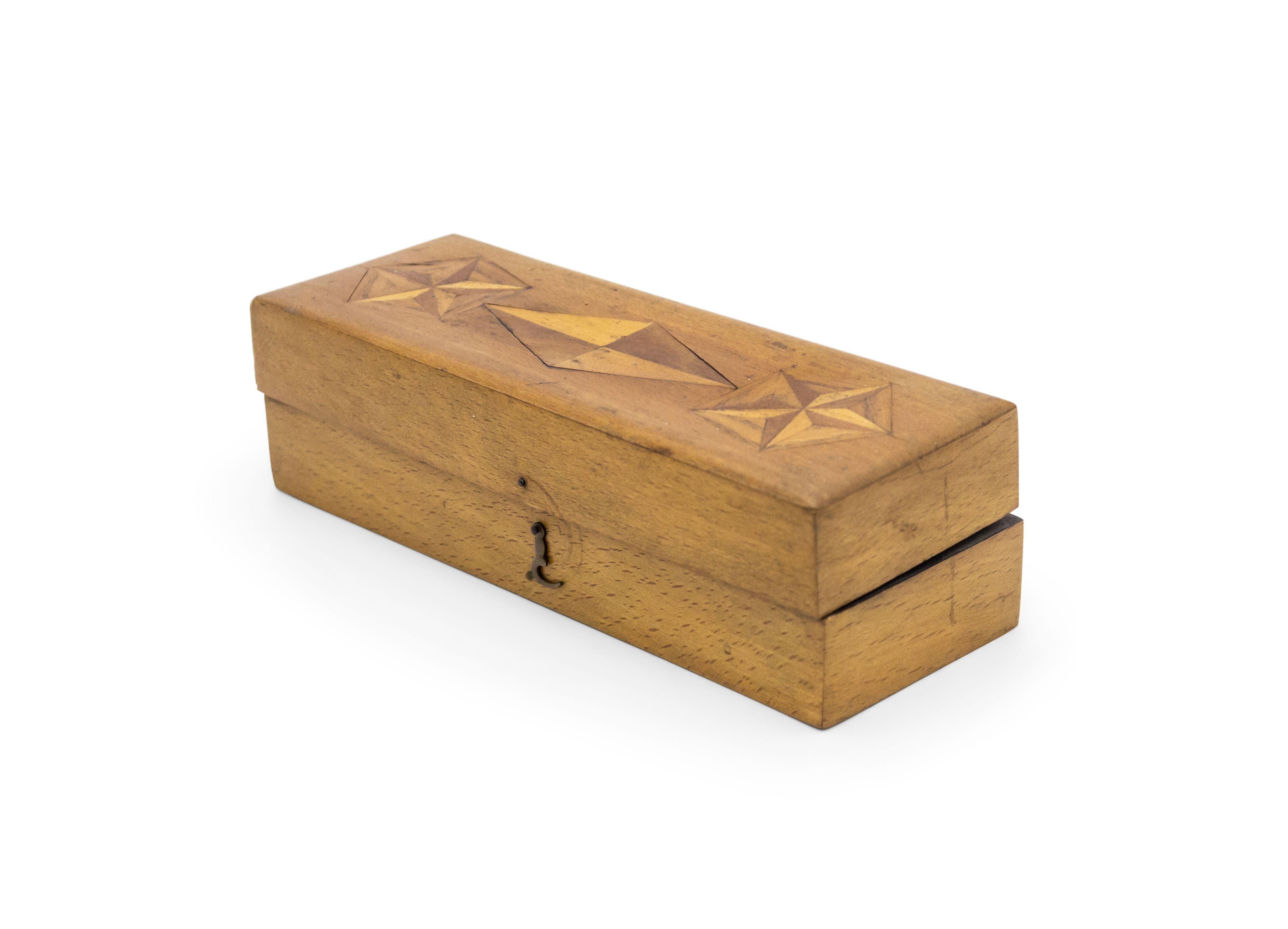 English Victorian-style rectangular light wood box with star and diamond shape inlays, with 3 compartments.
 