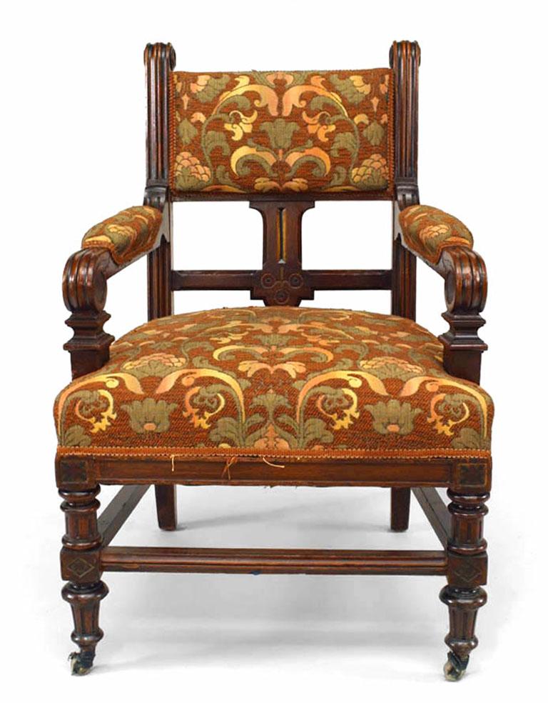 English Victorian walnut square back armchair with stretcher and brown tapestry upholstery.