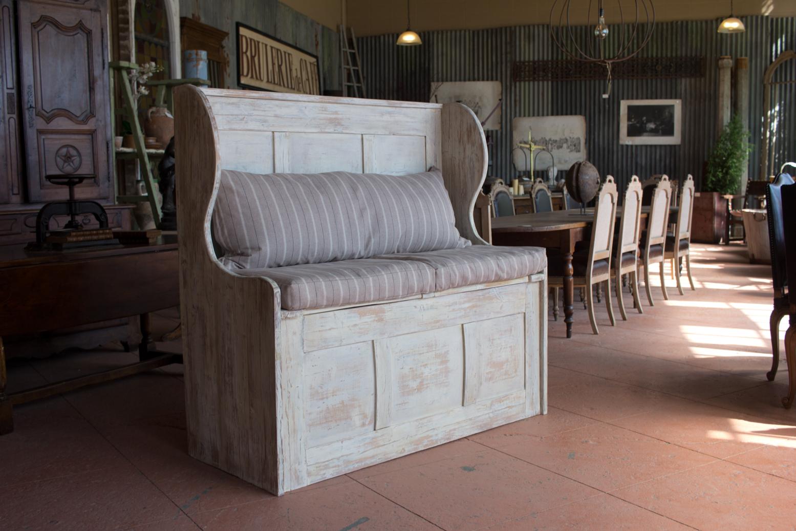 Lovely English vintage scraped back hand-painted pine box settle. Custom cushions and pillow have been made to compliment the style and for ease of lifting each side. Plenty of storage. 

Would look wonderful in a European farmhouse, rustic modern