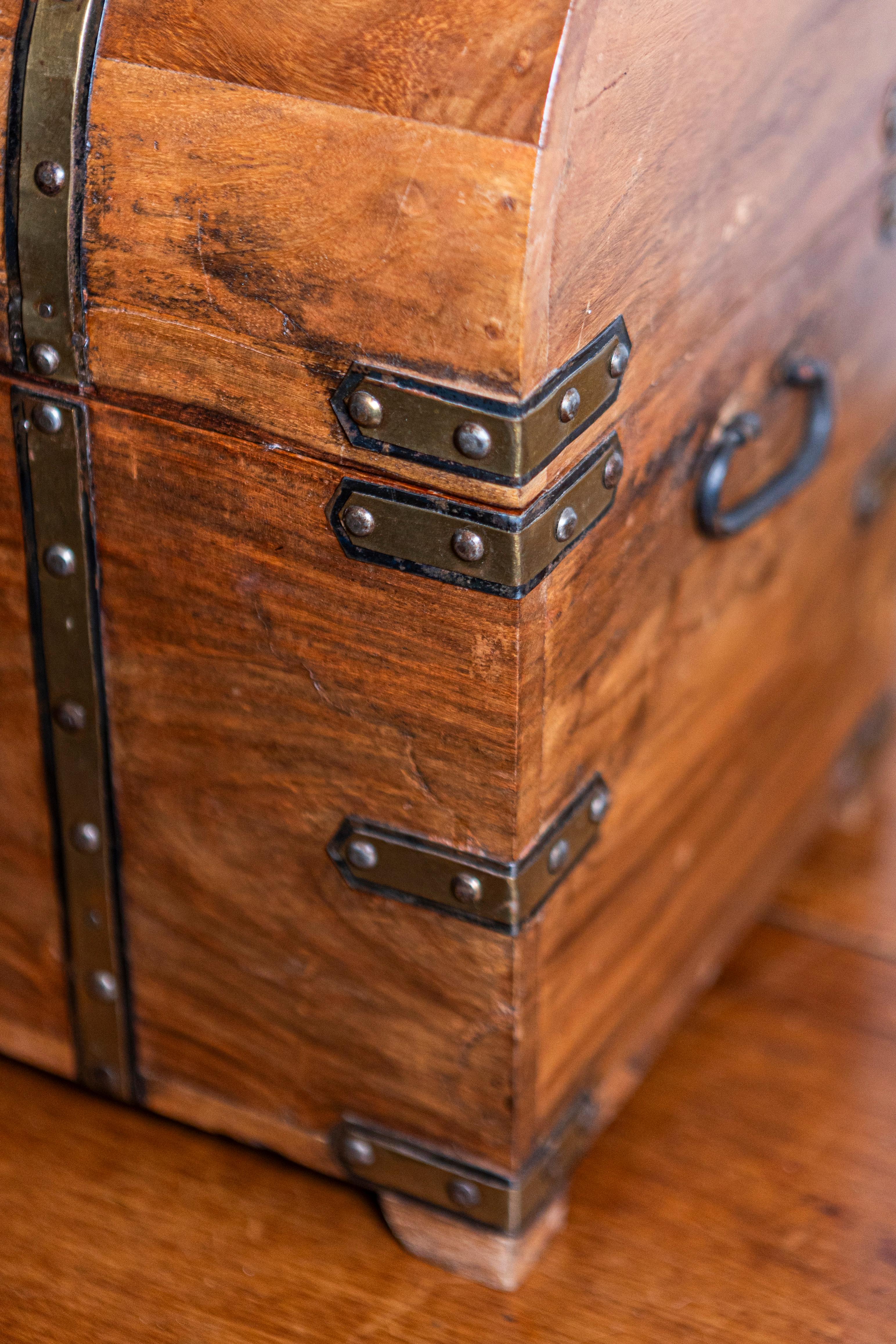 Carved English Vintage Wooden Treasure Chest Shaped Cellarette with Brass Details For Sale