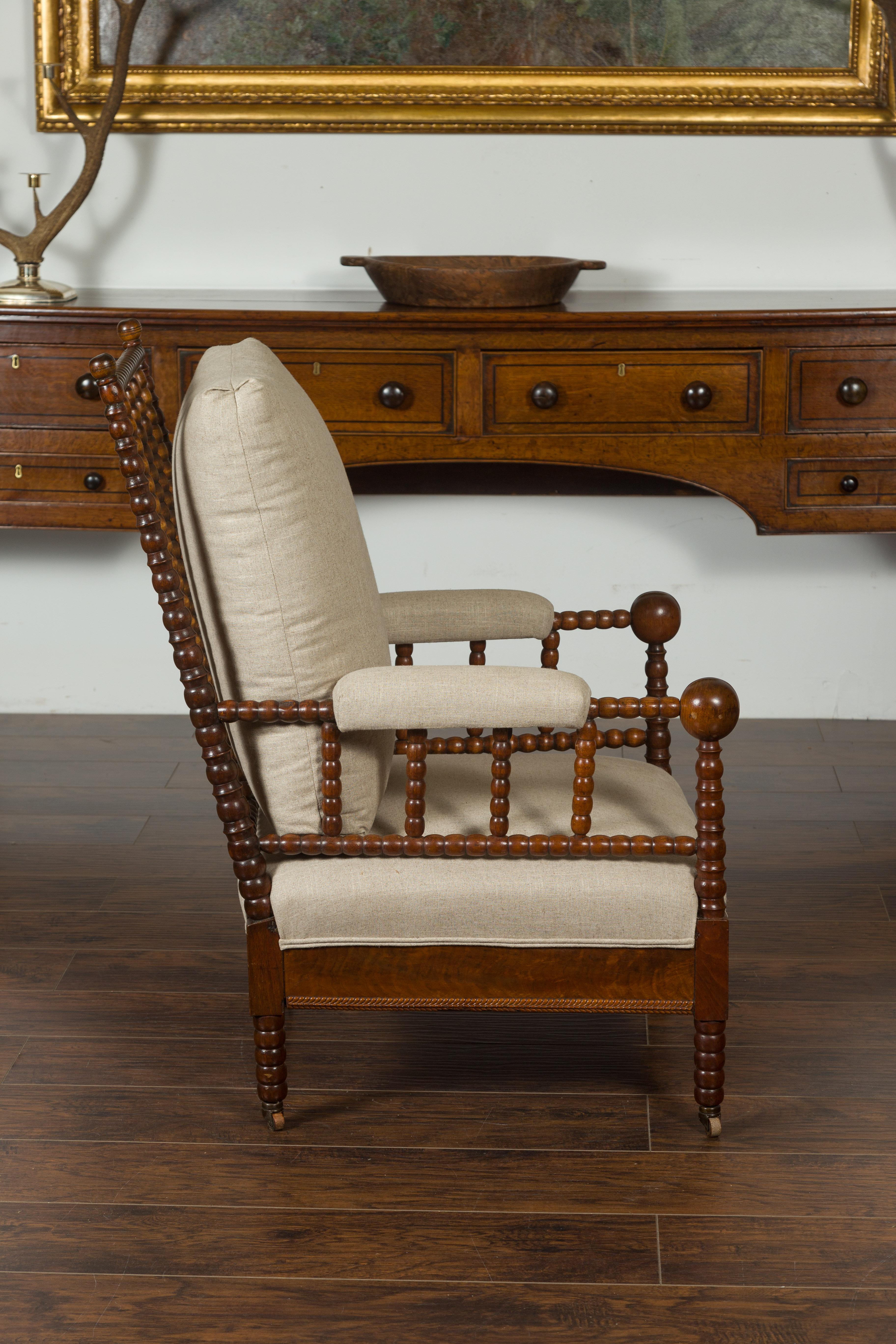 English Walnut Bobbin Armchair with New Upholstery and Casters, circa 1920 5