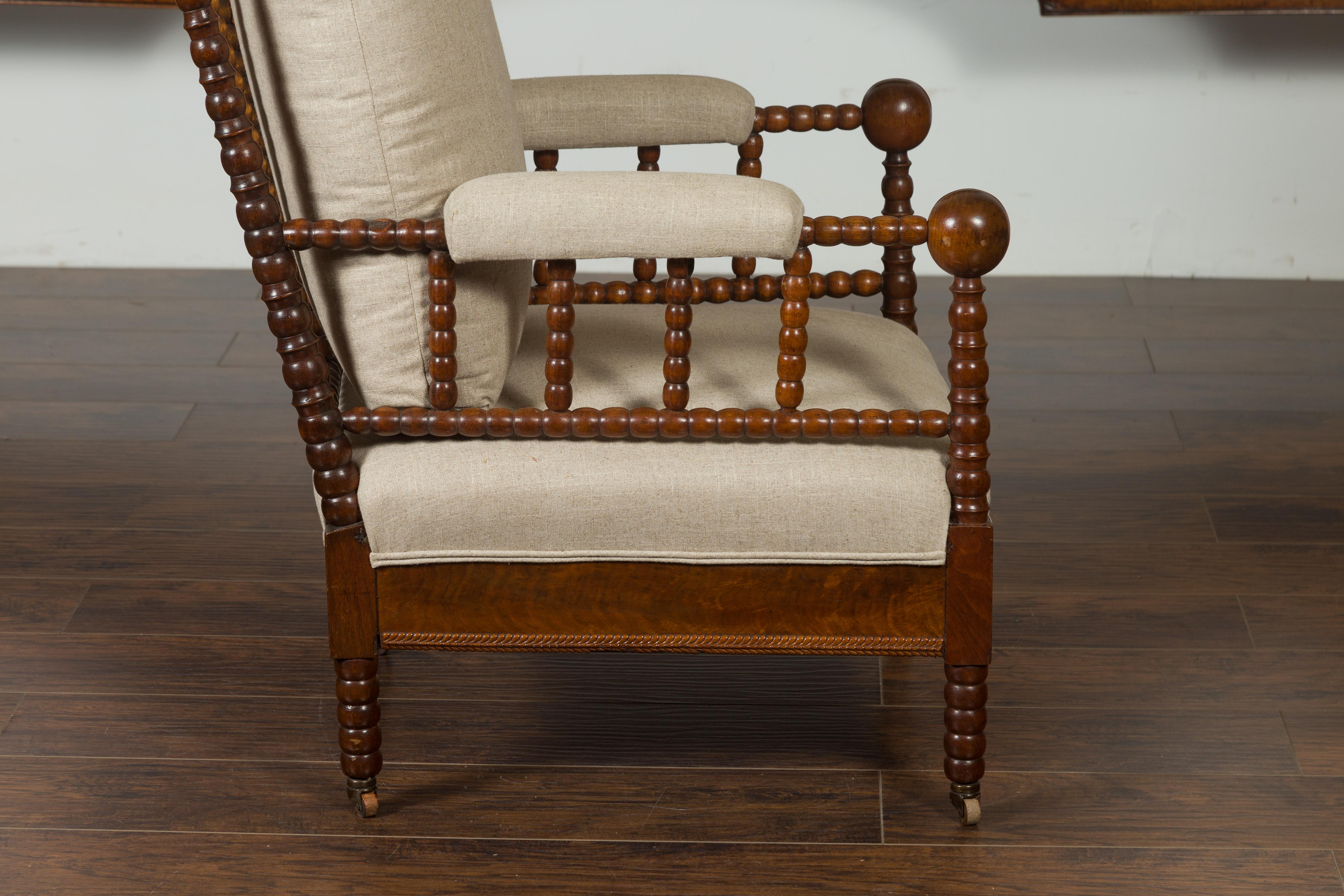 English Walnut Bobbin Armchair with New Upholstery and Casters, circa 1920 6