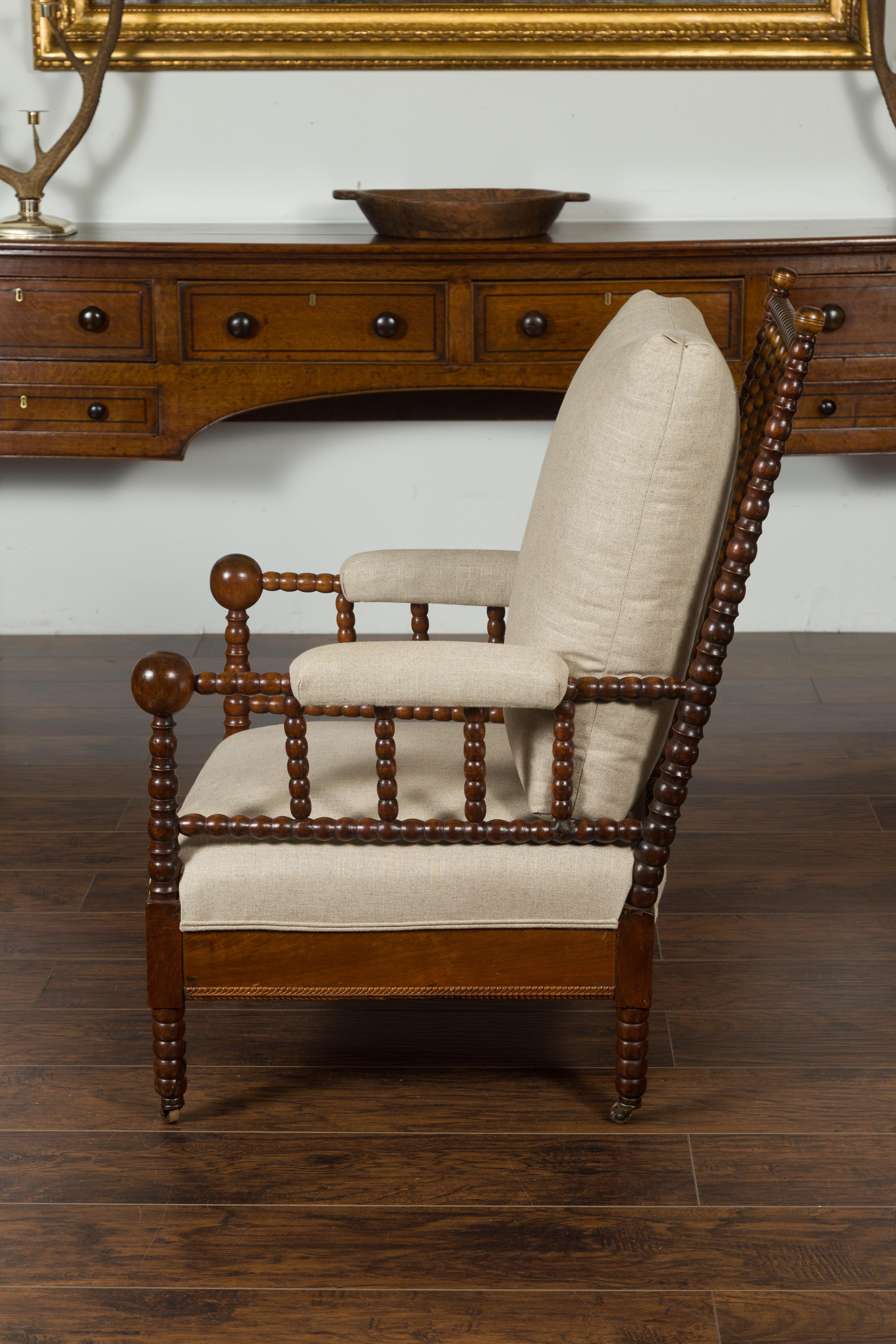 English Walnut Bobbin Armchair with New Upholstery and Casters, circa 1920 9