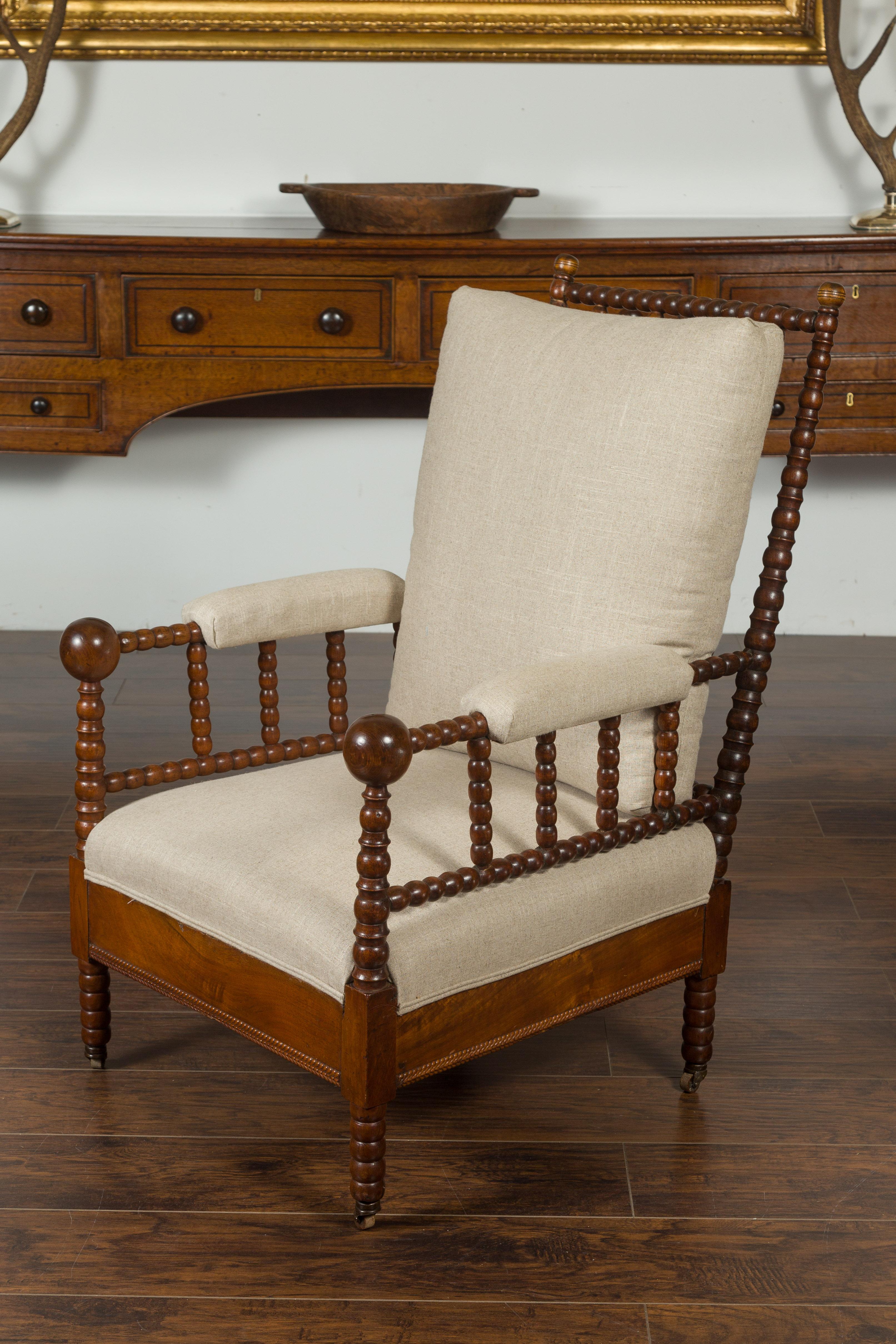 English Walnut Bobbin Armchair with New Upholstery and Casters, circa 1920 10