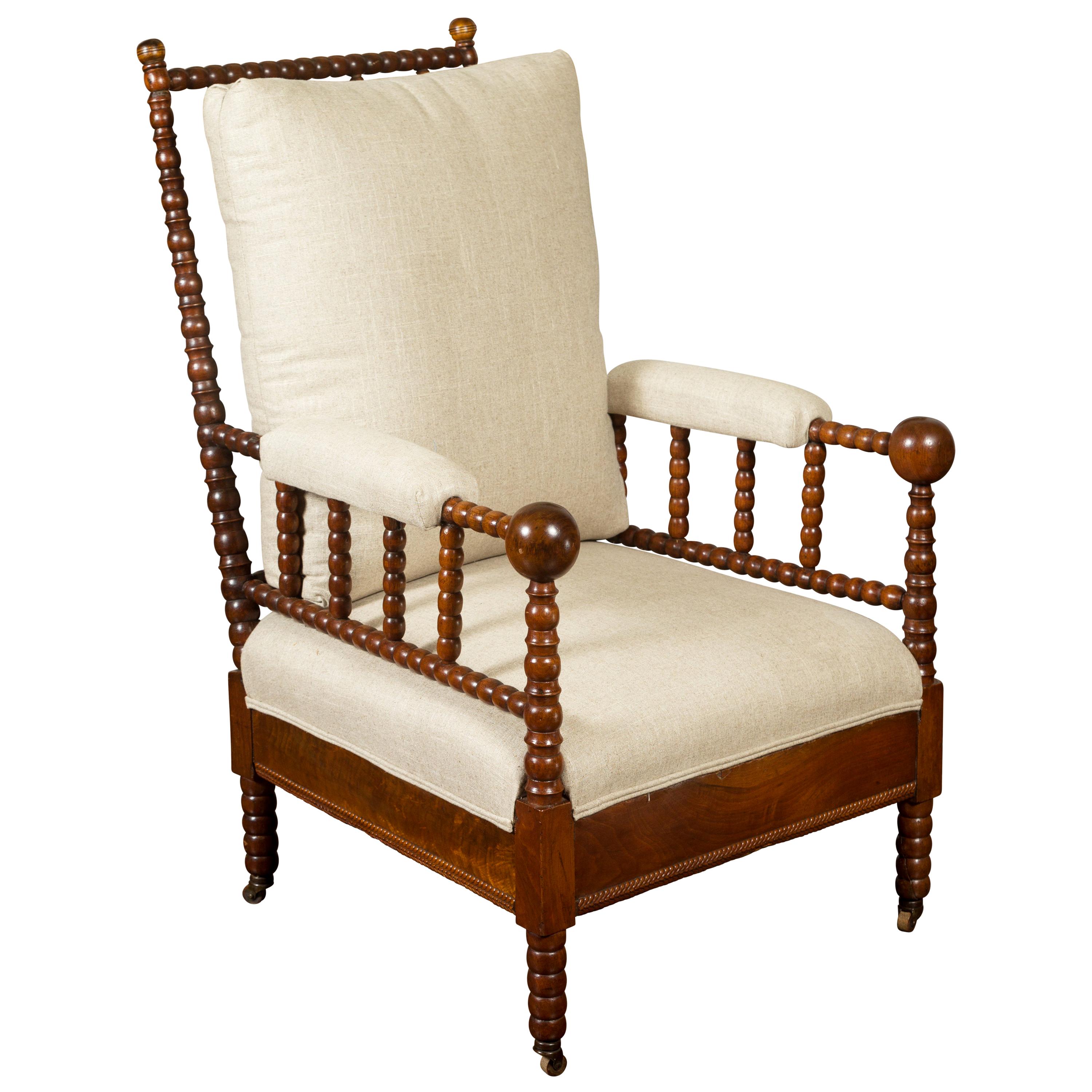 English Walnut Bobbin Armchair with New Upholstery and Casters, circa 1920