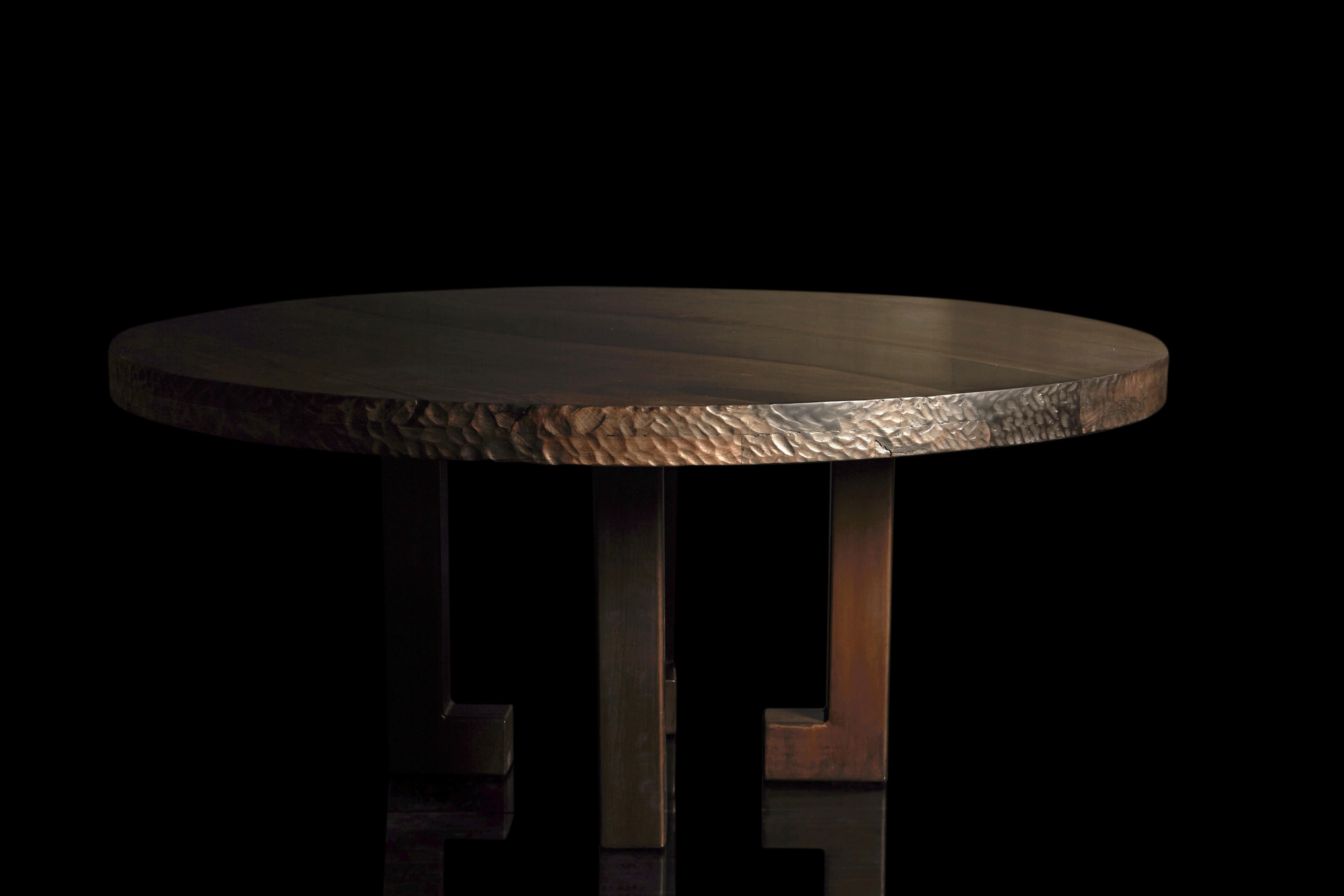 Commissioned for a private clients central London apartment, the top is made of English walnut with a central river of black resin, the legs are aged bronze.

Size: 1700 mm (67