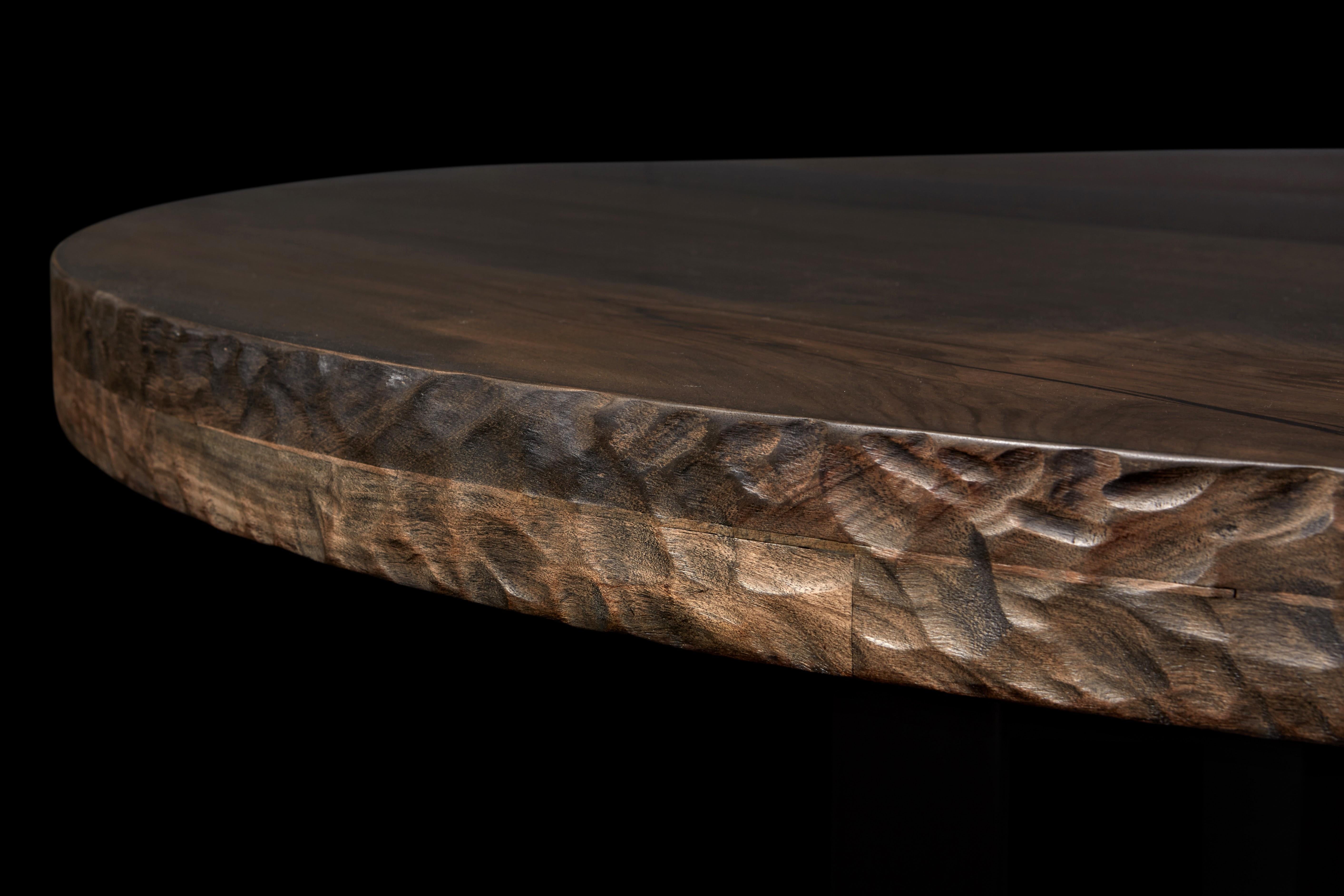 Contemporary Bronze Leg and English Walnut Round Table. by Jonathan Field.