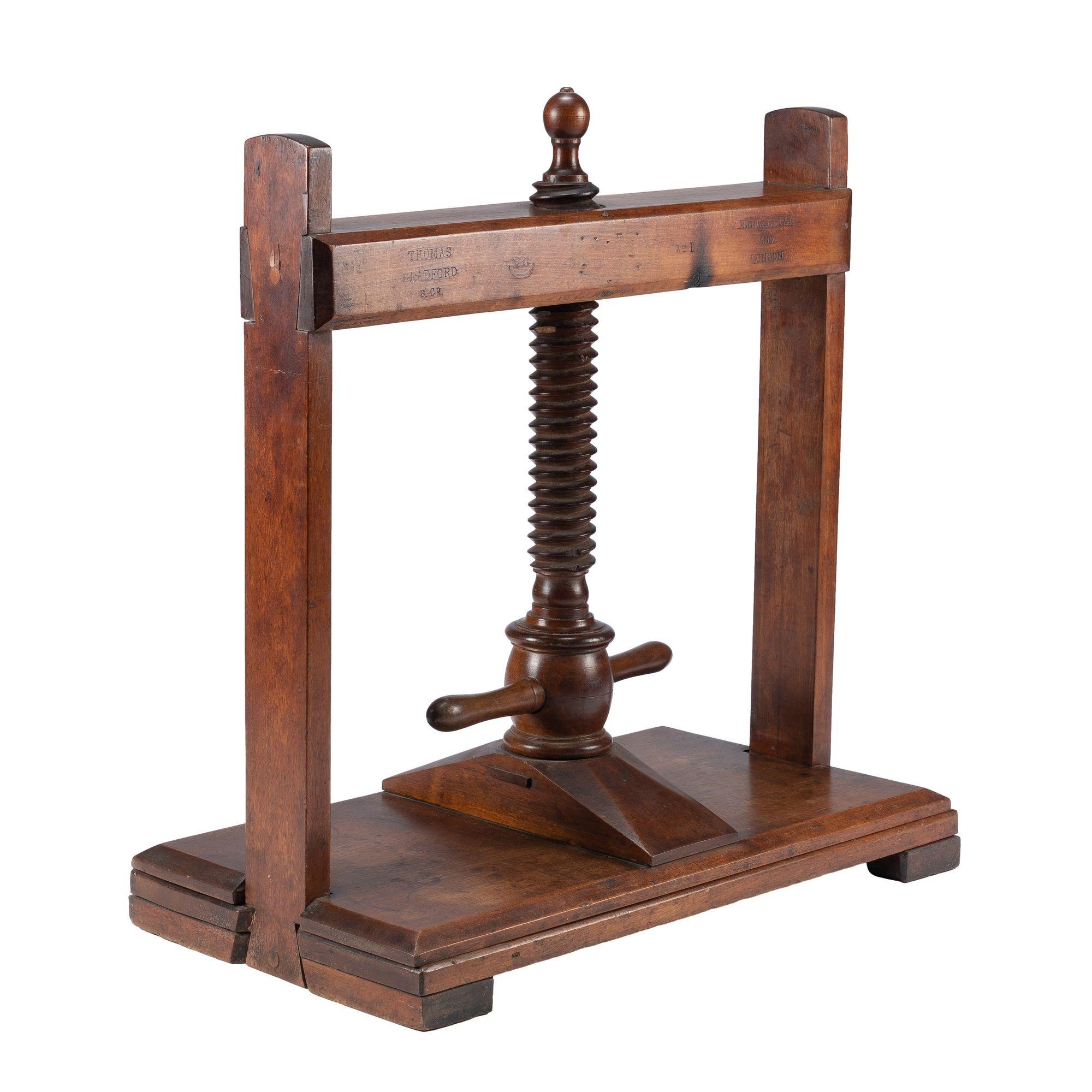 Industrial English walnut linen press by Thomas Bradford & Company, 1850-1900 For Sale