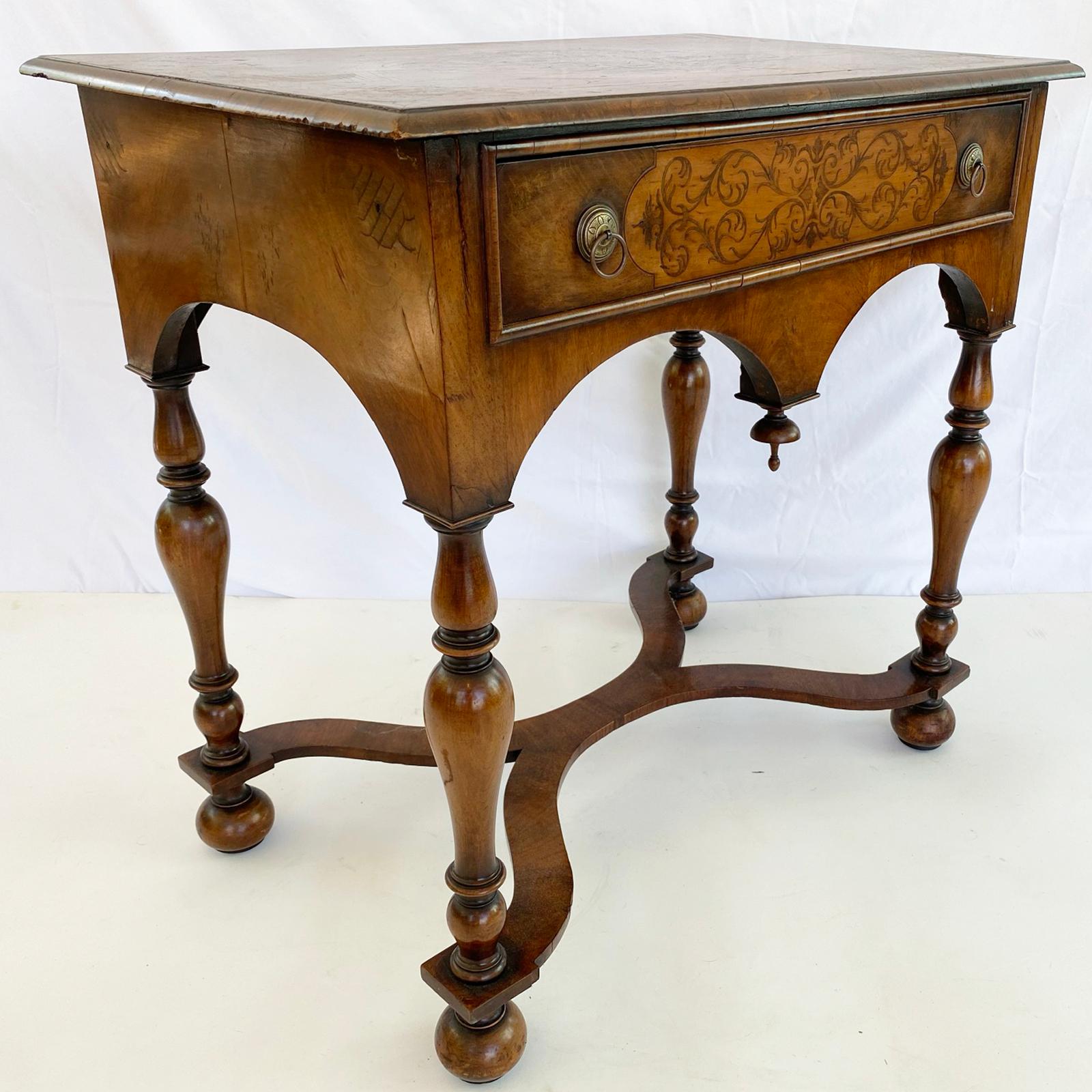 William and Mary English Walnut Lowboy with Seaweed Marquetry Inlay and Cross Banded Top