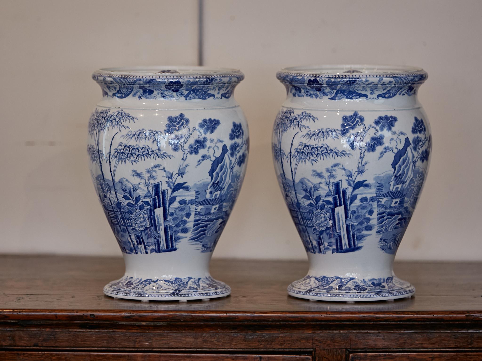 Victorian English Wedgwood Blue Palissade Lidded Urns with Chinoiserie Gardens, a Pair