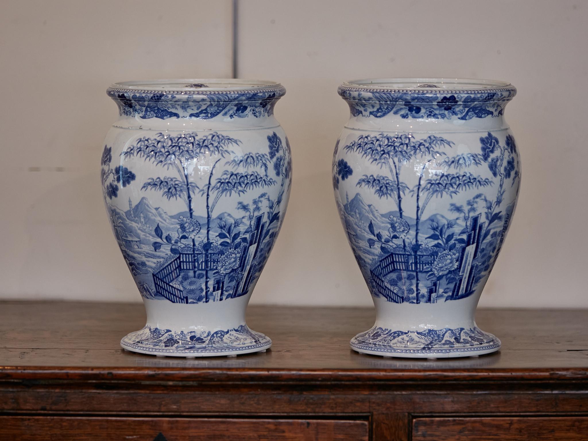 English Wedgwood Blue Palissade Lidded Urns with Chinoiserie Gardens, a Pair In Good Condition In Atlanta, GA