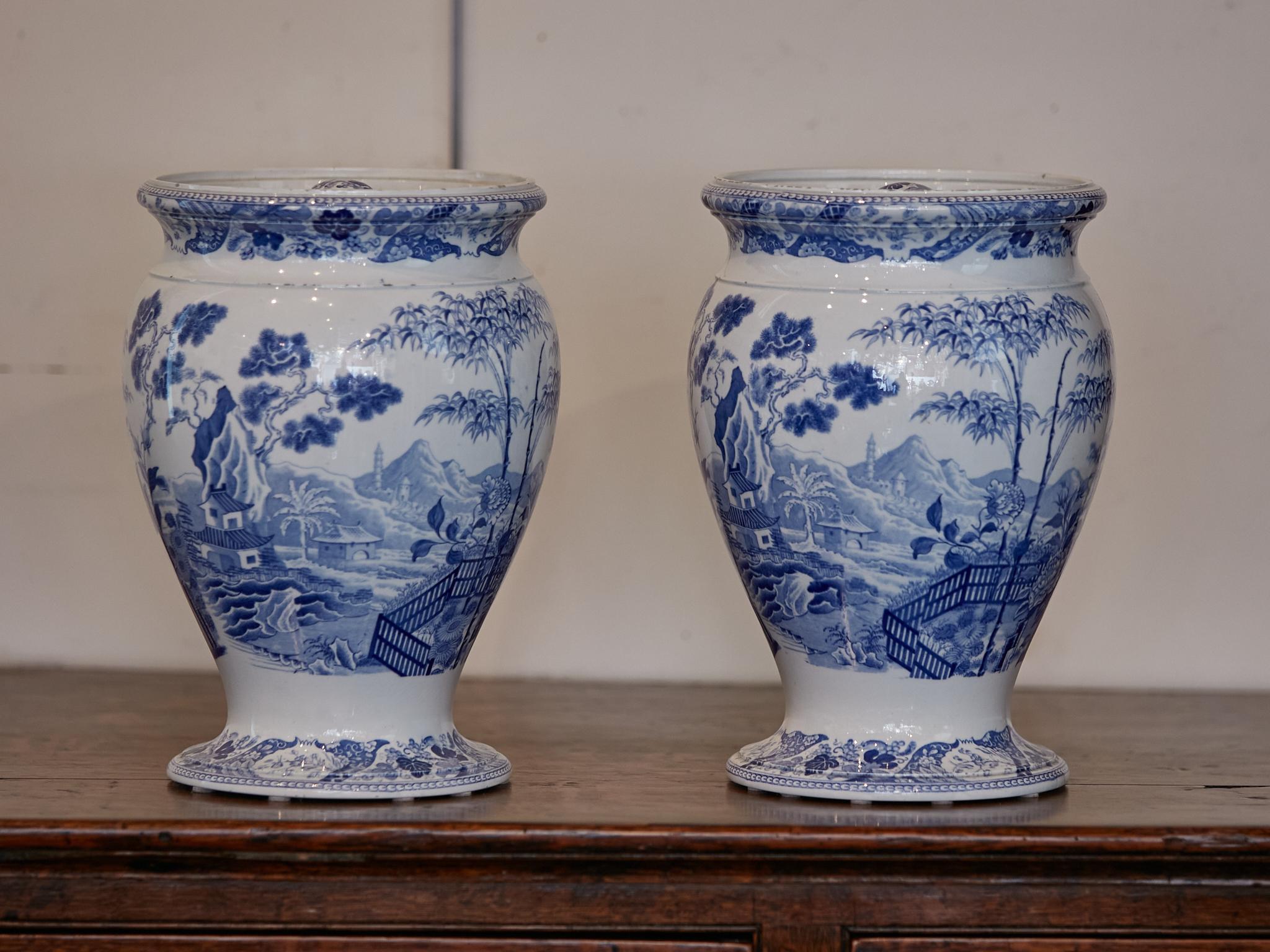 19th Century English Wedgwood Blue Palissade Lidded Urns with Chinoiserie Gardens, a Pair