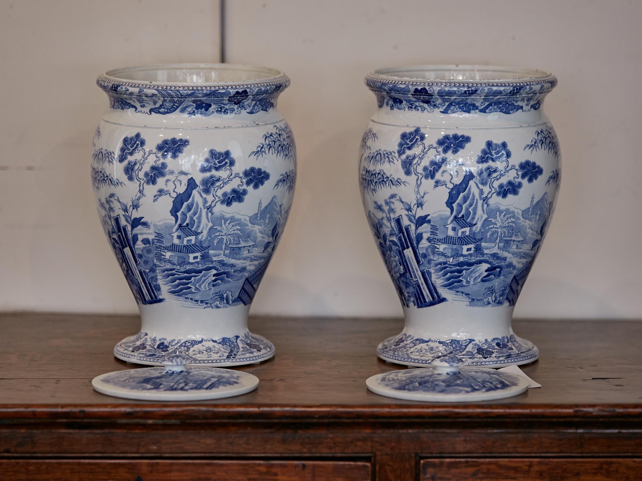 English Wedgwood Blue Palissade Lidded Urns with Chinoiserie Gardens, a Pair 1