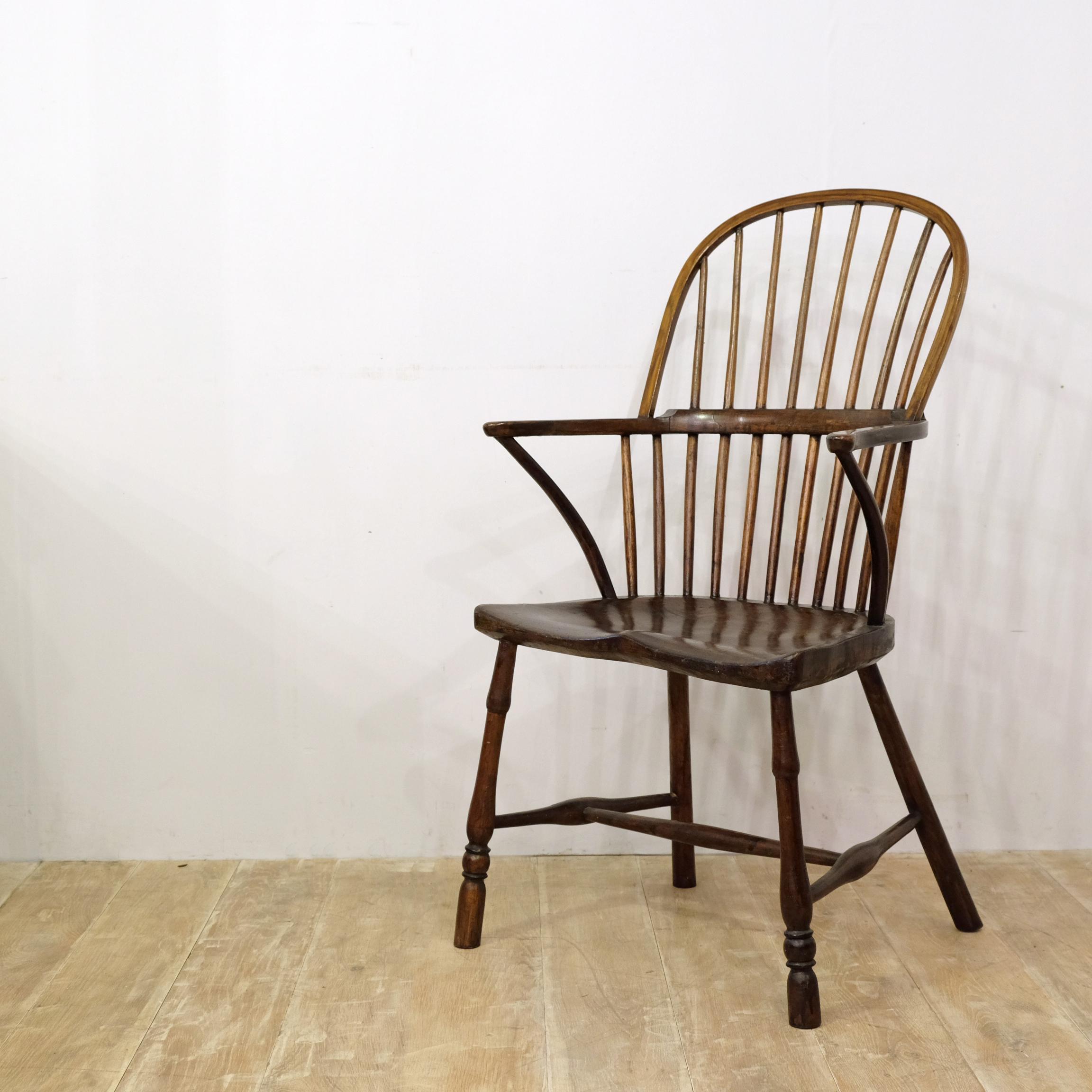 Delightful mid-19th century stickback Windsor chair. Originating from the Westcountry, most likely Cornwall, this example has the charming flat fronted shaped seat, egg and reel turned front legs with plain rear legs, hand drawn spindles and subtly