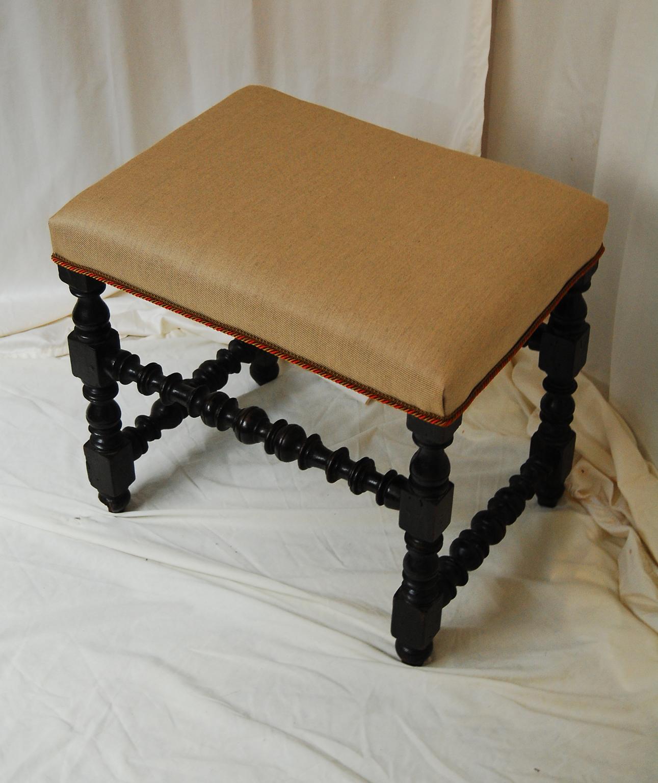 English William and Mary period turned leg upholstered stool with four boldly hand turned stretchers. and legs. This rare stool retains its original patination and is in excellent condition. One leg has 1/2