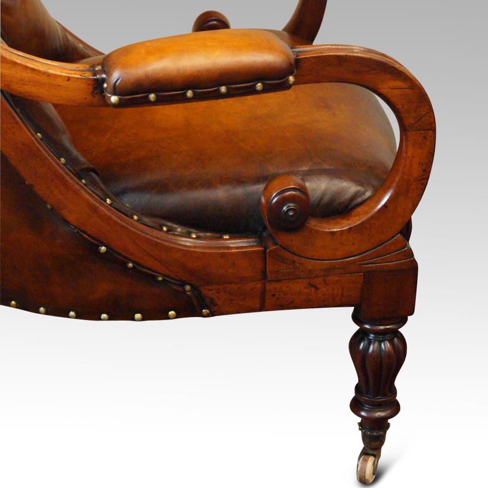 19th century button back leather reading easy chair
This 19th century. Button back leather reading easy chair was made circa 1835.
It stands on lovely fluted and turned front legs with its brass cup and porcelain rolling castors.
The chair is