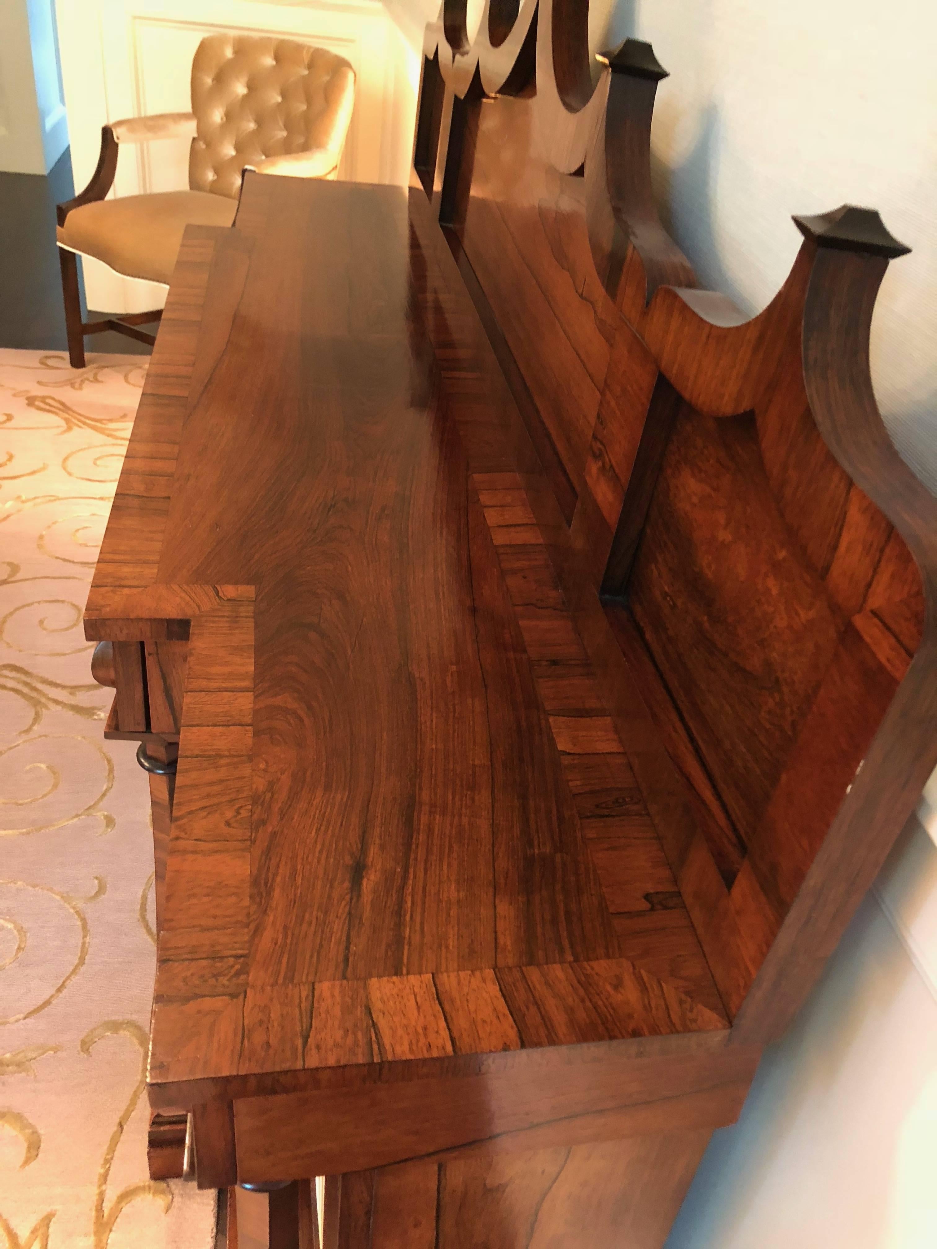 English William IV rosewood sideboard in the gothic-revival style four (4) drawers over four (4) doors. Having the Chinese influence of the following.
Most significant and widespread of Gothic revivals in Europe was it's mid-nineteenth century