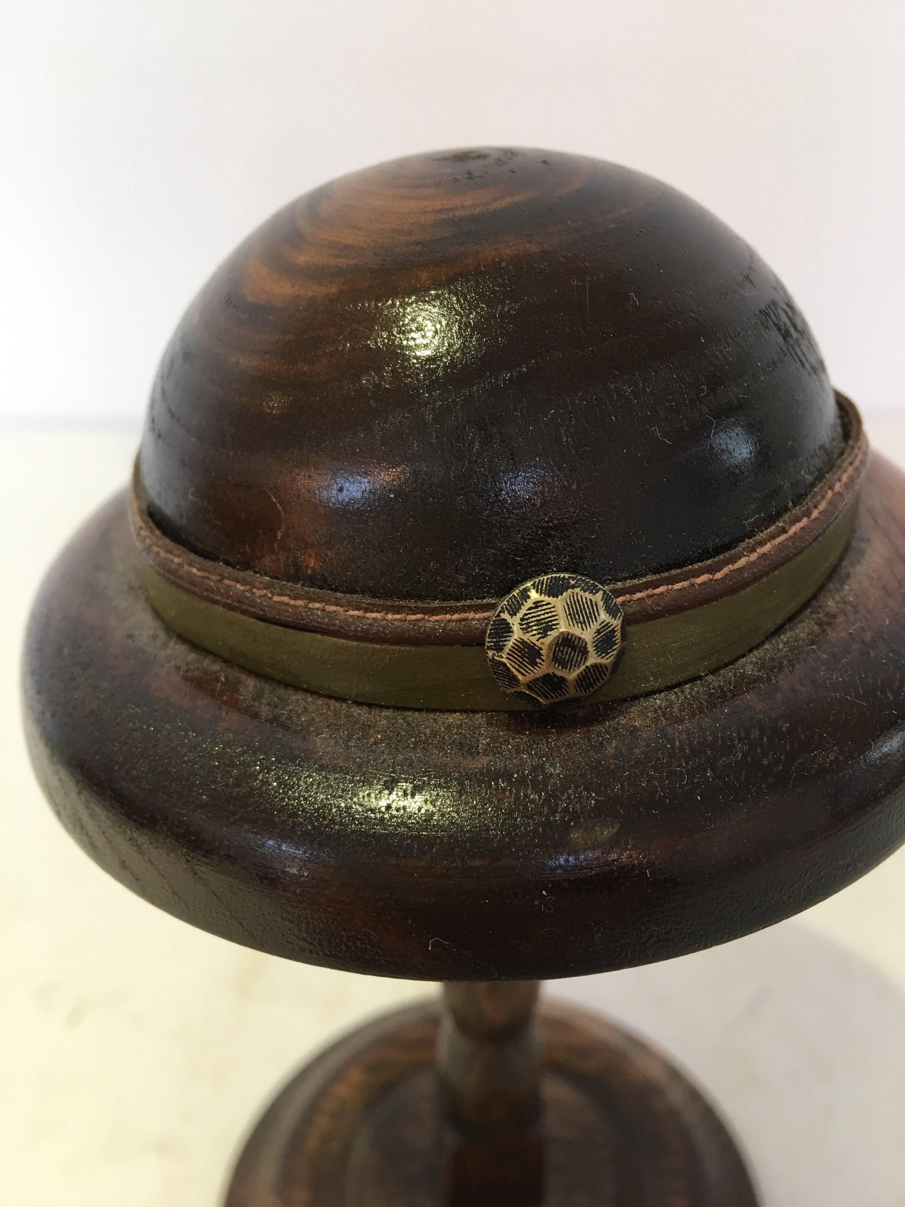 Exquisite English wood doll hat form mold on wood stand
circa 1920-1940s #3503
Green leather brim with round metal stud detail.