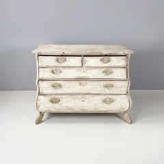 English Wooden chest of drawers with not-uniform white finish, 1700s