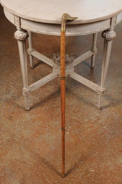 English Wooden Walking Cane with Brass Duck Head Handle and Ebonized Accents