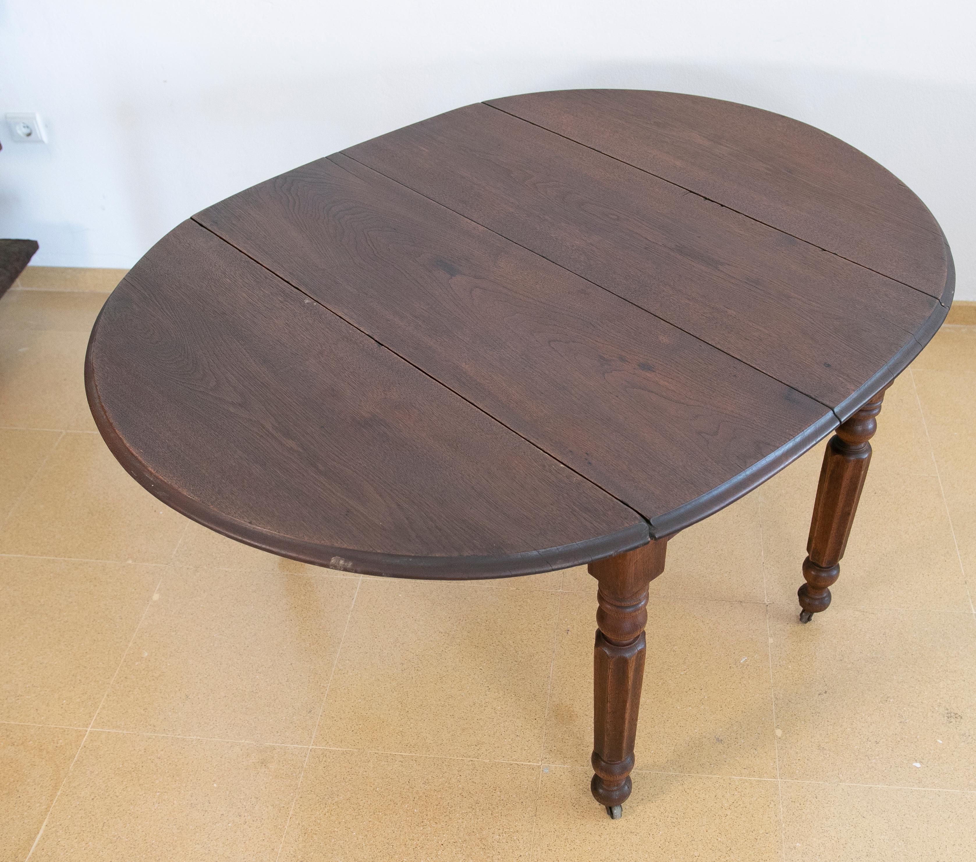 English Wooden Wing Table with Brass Wheels For Sale 3