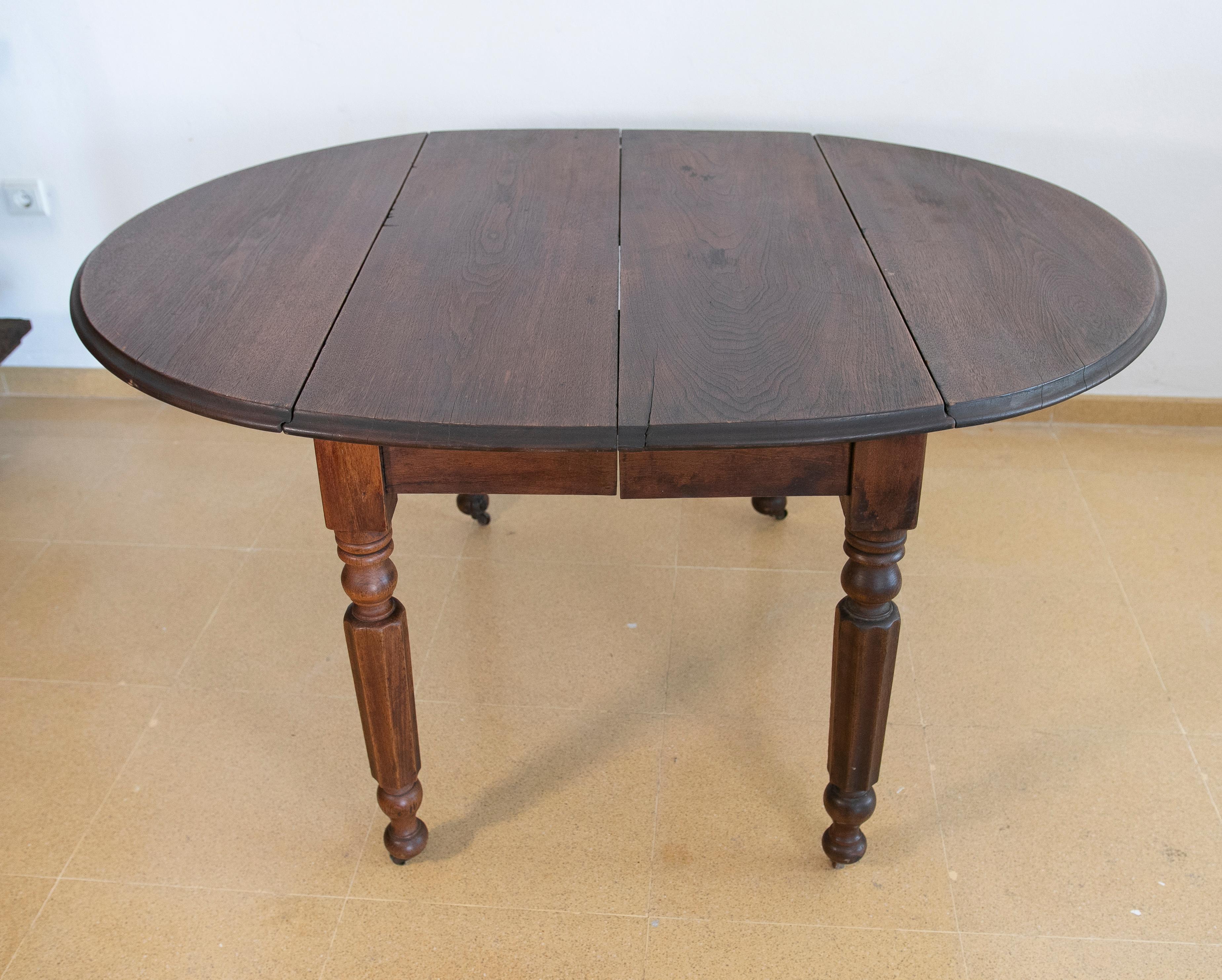 English Wooden Wing Table with Brass Wheels For Sale 4