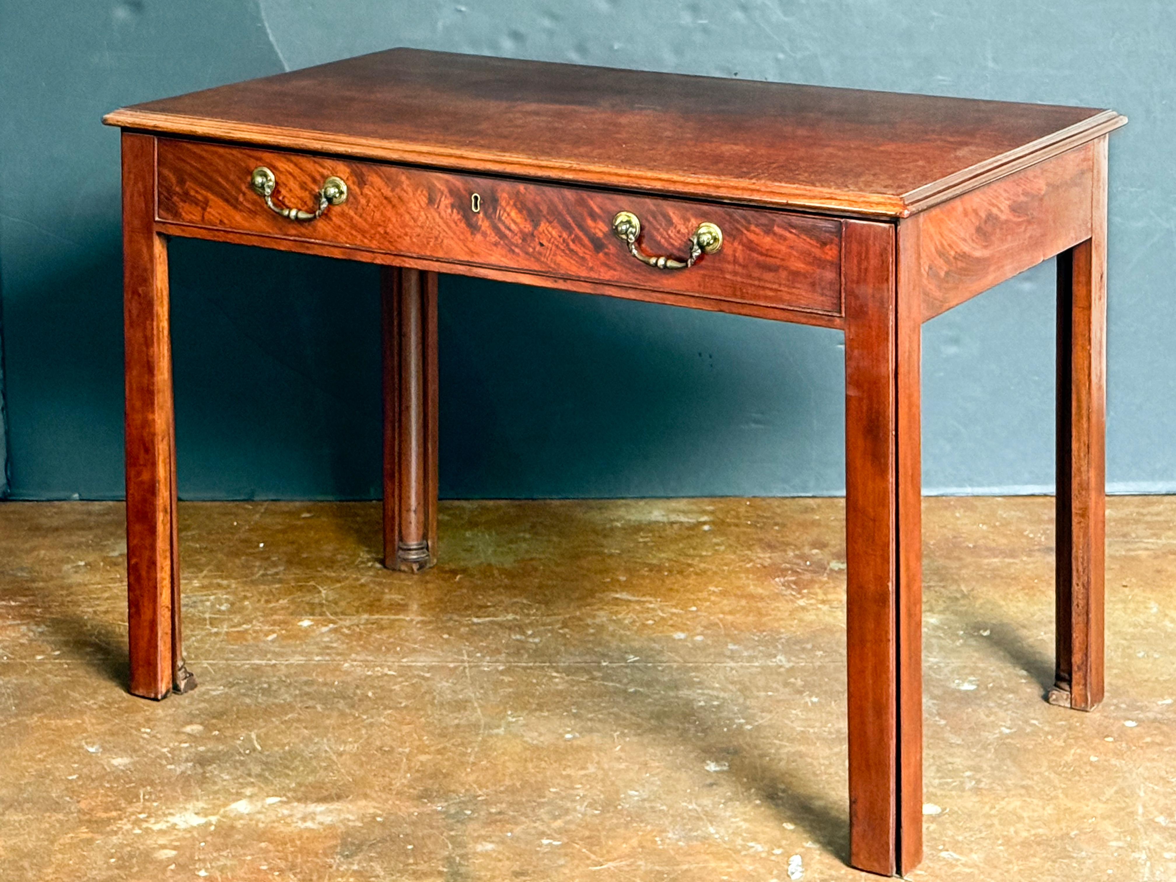 English Writing Table or Desk of Mahogany with Slide from the Georgian Period For Sale 9
