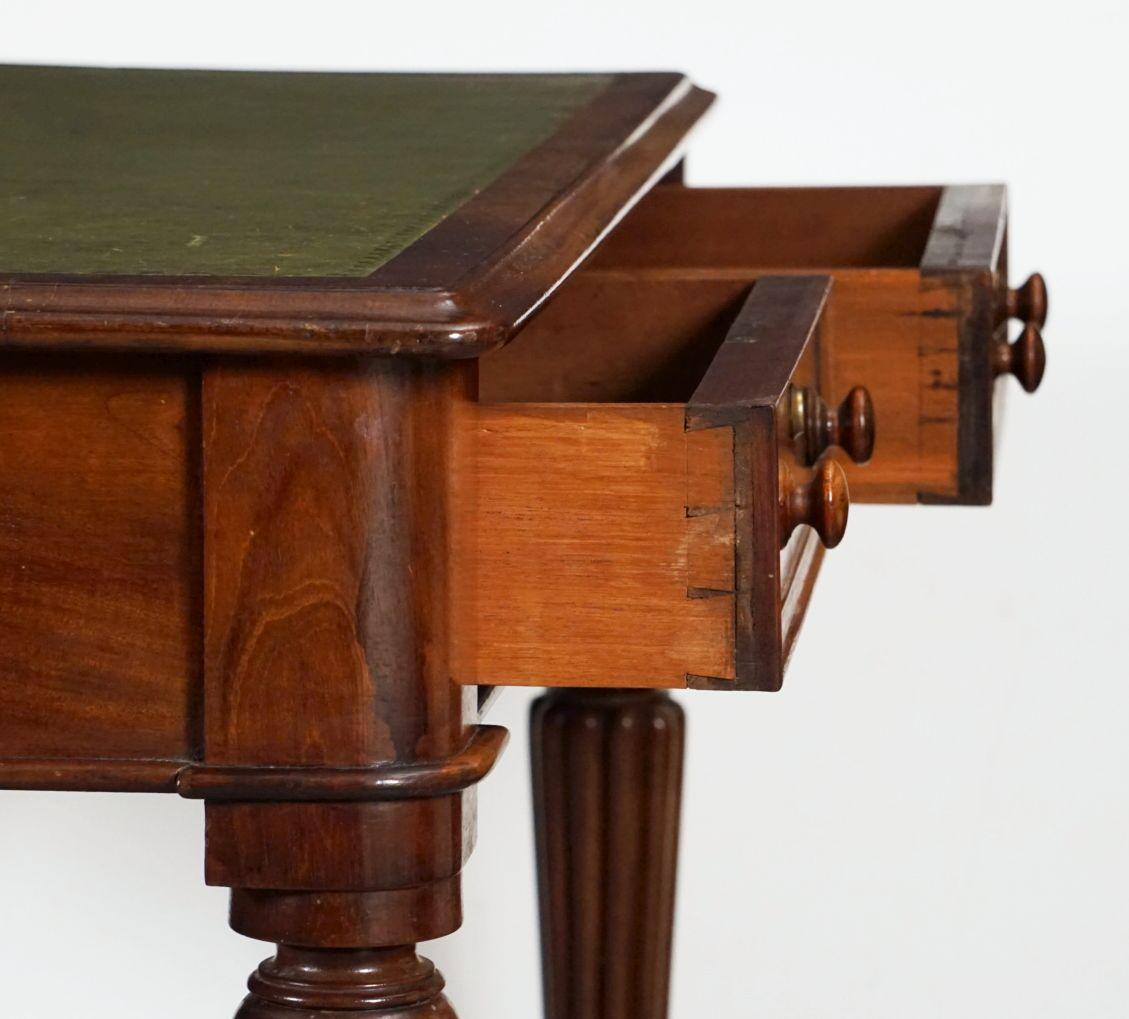 Turned English Writing Table or Desk with Embossed Leather Top from the William IV Era