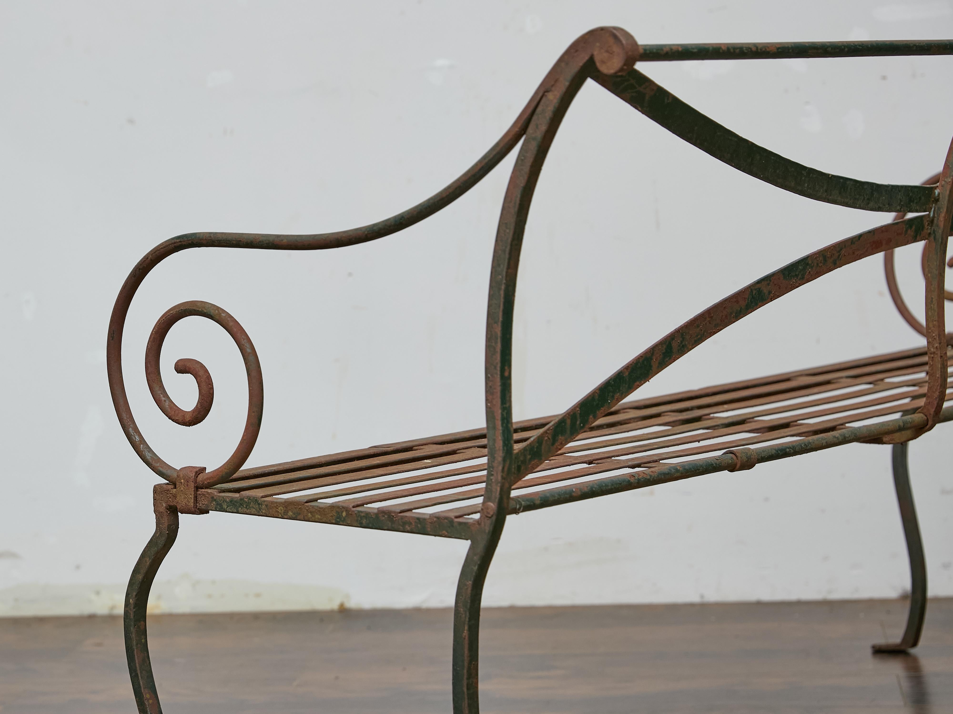 English Wrought Iron Garden Bench with Scroll Arms and X-Back, circa 1920 For Sale 6
