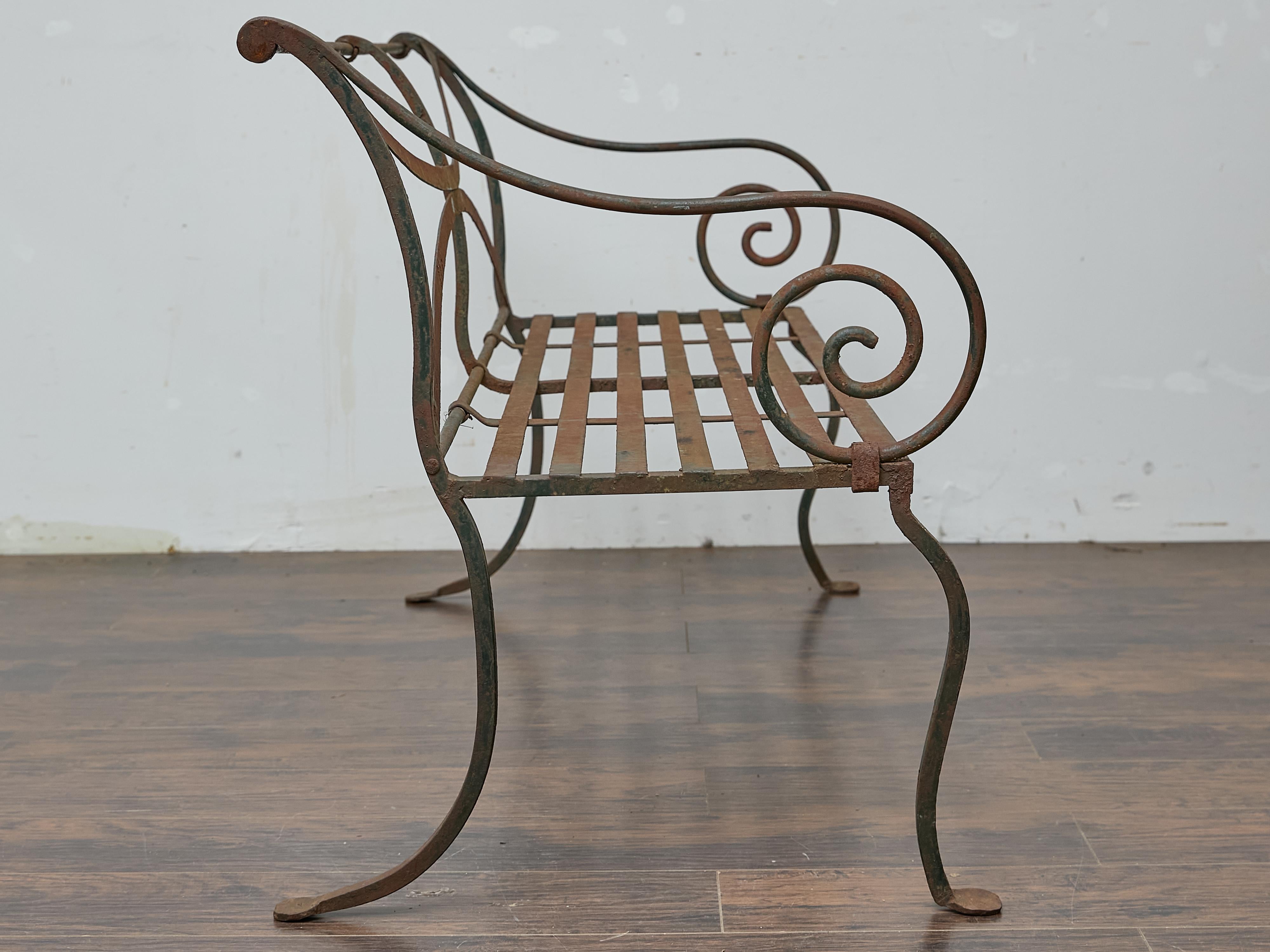 English Wrought Iron Garden Bench with Scroll Arms and X-Back, circa 1920 In Good Condition For Sale In Atlanta, GA