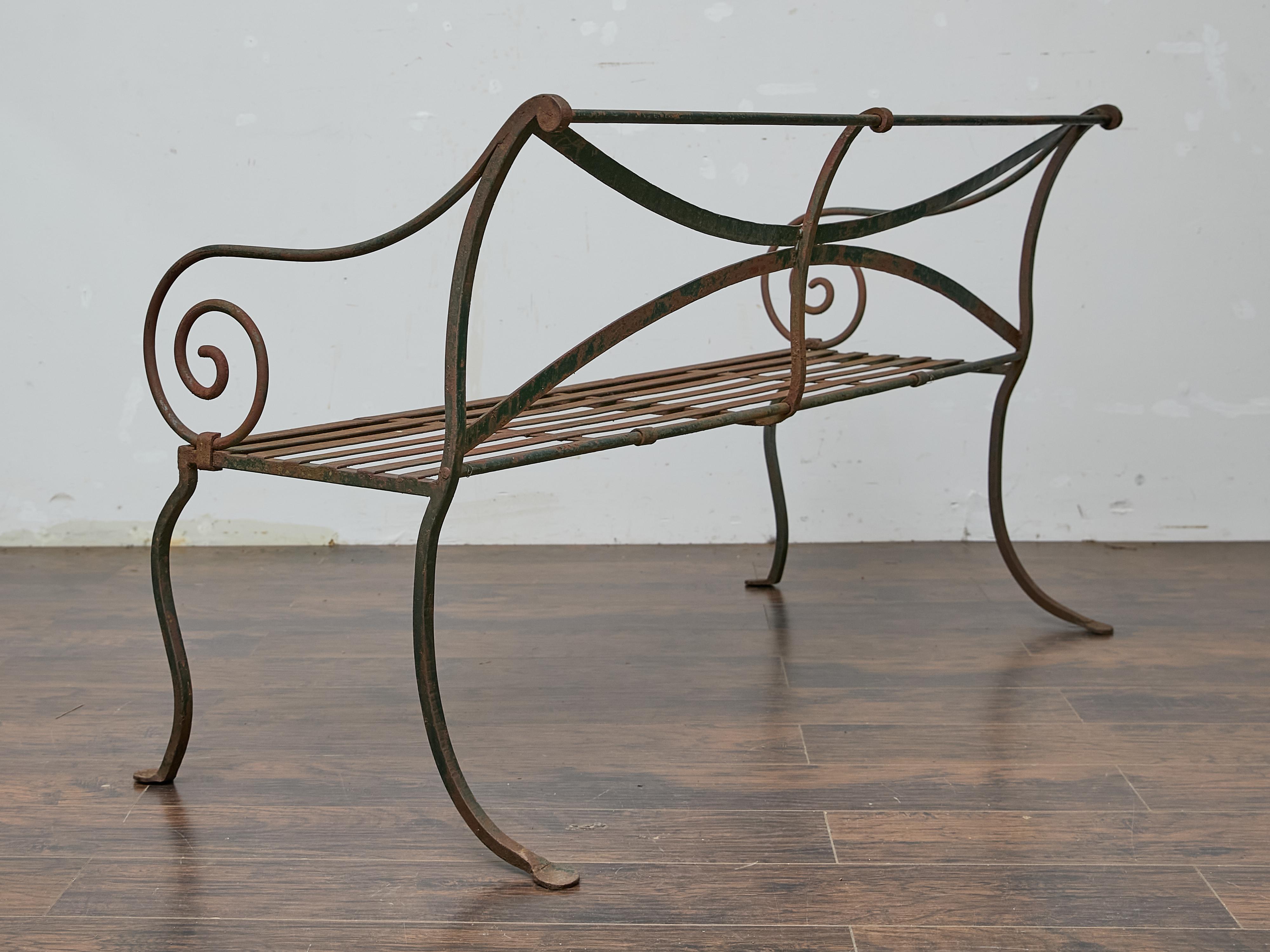 English Wrought Iron Garden Bench with Scroll Arms and X-Back, circa 1920 For Sale 4
