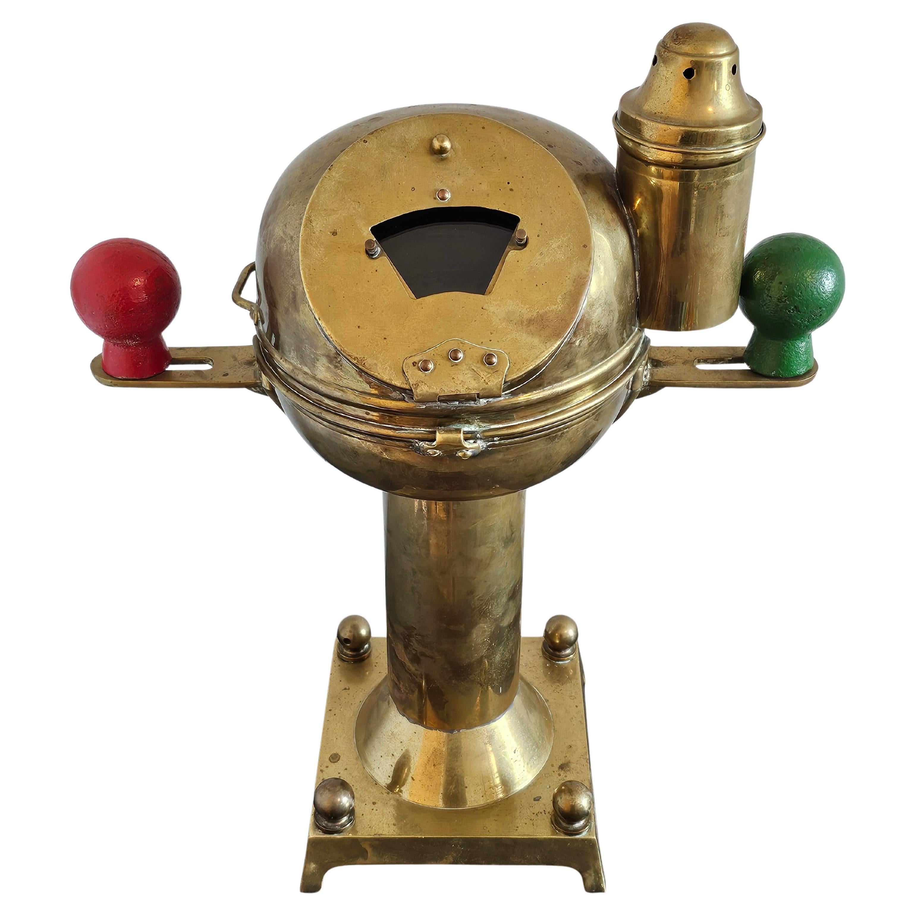 A visually striking smaller scale vintage WWII era maritime salvage ship's binnacle pedestal with compass by Sestrel Henry Browne & Son. circa 1940s 

The beautifully aged heavily patinated polished brass binnacle housing a high quality marine