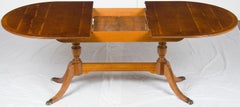 English Yew Wood Extending Dining Room Table with Self Storing Leaf