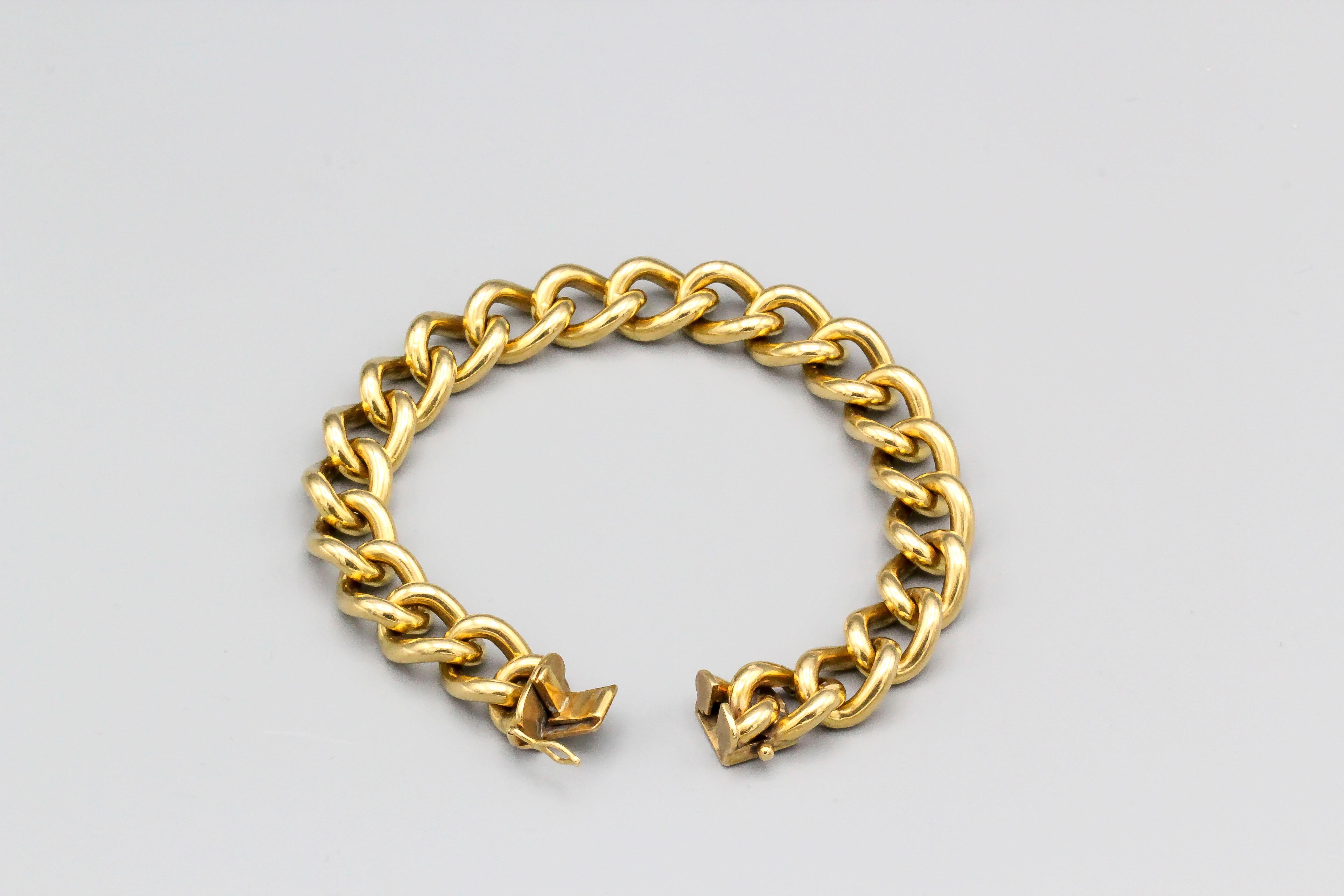 Interesting 18k gold link bracelet, of English origin circa 1960s.  It weighs a hefty 73.7 grams and measures over 7.5 inches long.

Hallmarks: maker's marks, 18ct