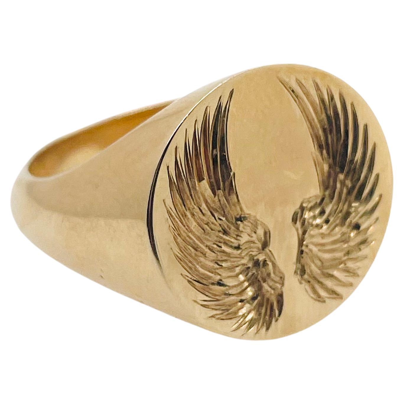 Solid signet ring , size Q (AUD/UK)

Hand engraved with angel wings

9ct yellow gold

Customisable - Please message our designer to start the process