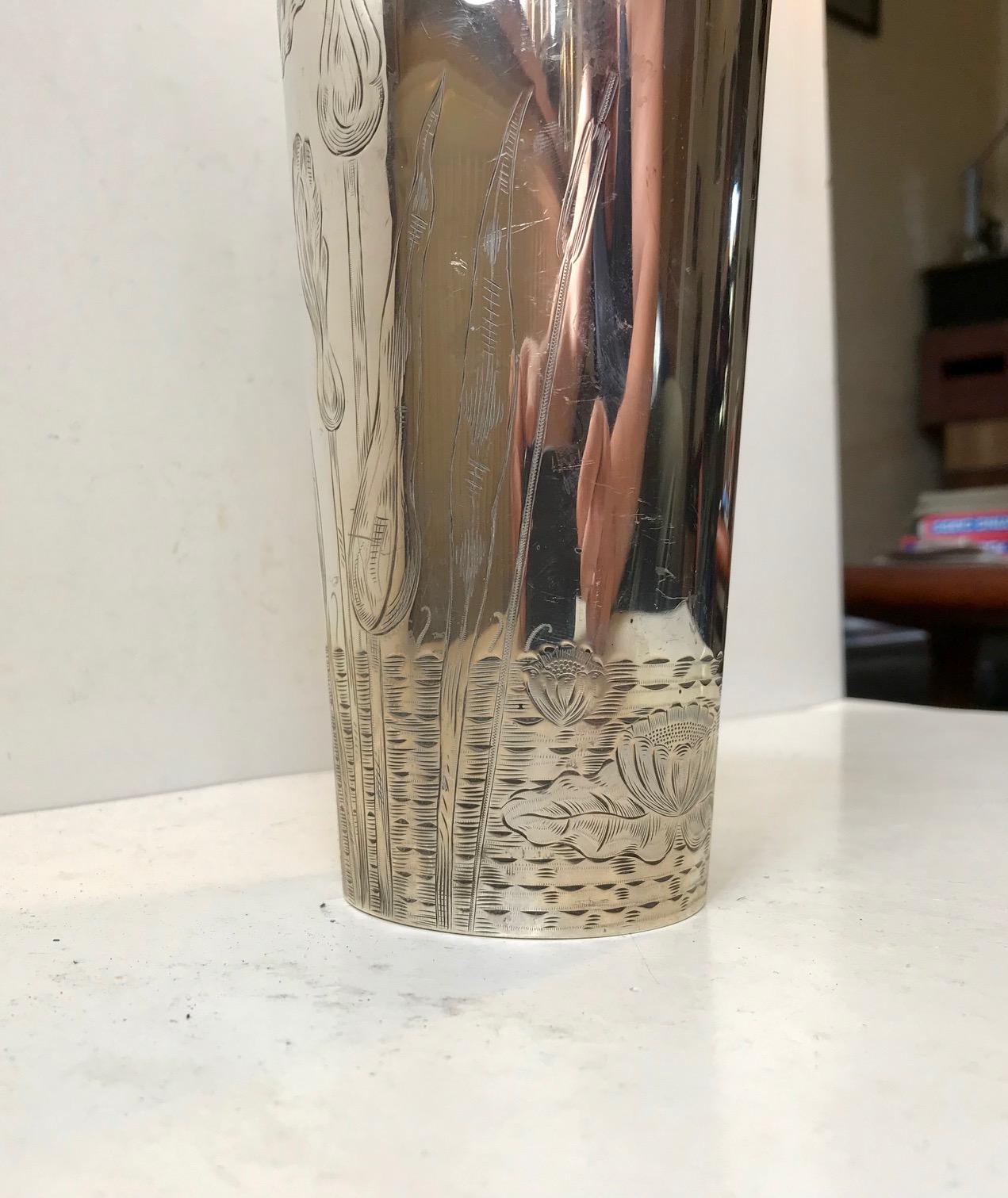 Tall partially engraved sterling silver vase with crystal insert. Very practical when used for displaying flowers. It was designed in 1904 by Danish silversmith C. C. Christensen. Fully hallmarked to the base with the maker/designer and the 3 towers