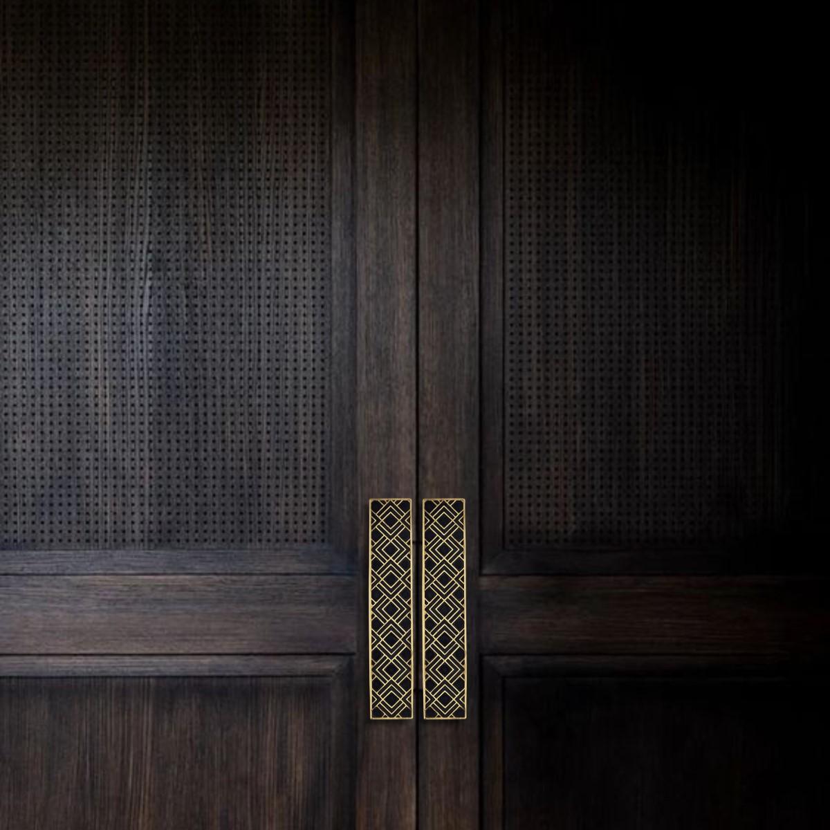 Use: Indoor 

This rectangular cabinet pull is crafted from solid brass using a traditional engraving process. The precise pattern draws inspiration from Art Deco ornamentation, featuring geometric lines that are carefully hand-filled with black