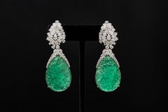 Engraved Carving of 58.34cts and 53.94cts Antique Emerald Earring