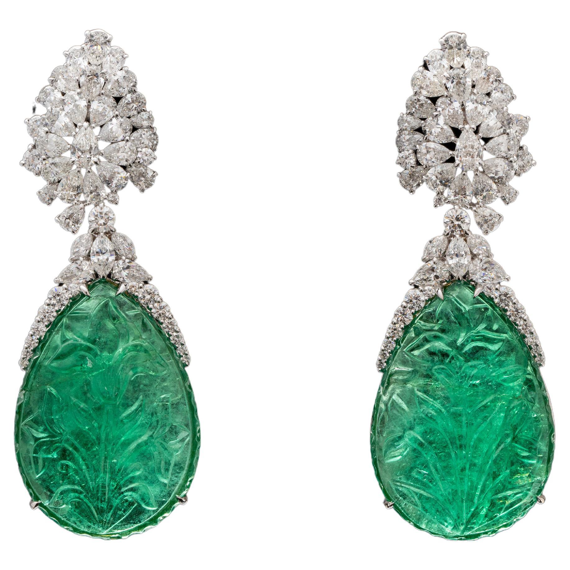 Engraved Carving of 58.34cts and 53.94cts Antique Emerald Earring For Sale