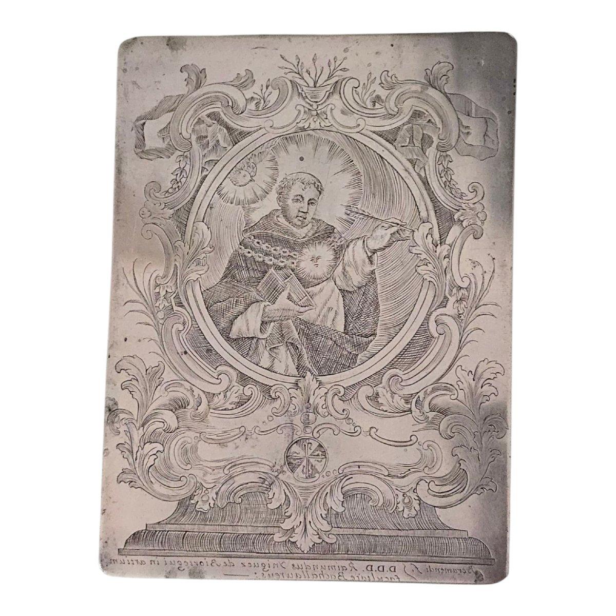 Interessante e rara lastra di rame originale del XVIII secolo utilizzata per la stampa di incisioni religiose. Il piatto è finemente inciso a bulino e raffigura scene sacre tipiche dell'arte devozionale dell'epoca. Questo pezzo è firmato