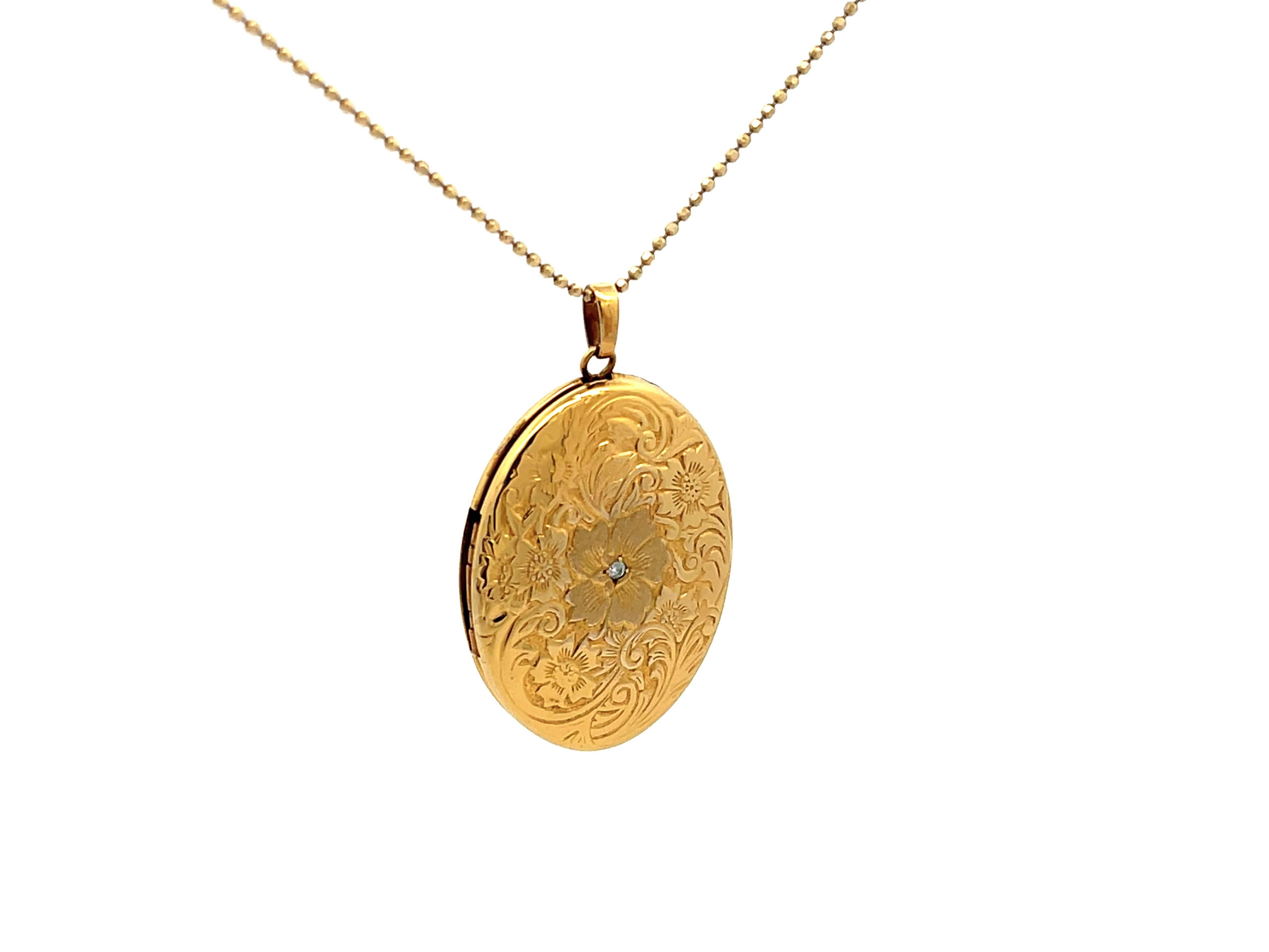 Brilliant Cut Engraved Diamond Plumeria Oval Locket Necklace in 14k Yellow Gold For Sale
