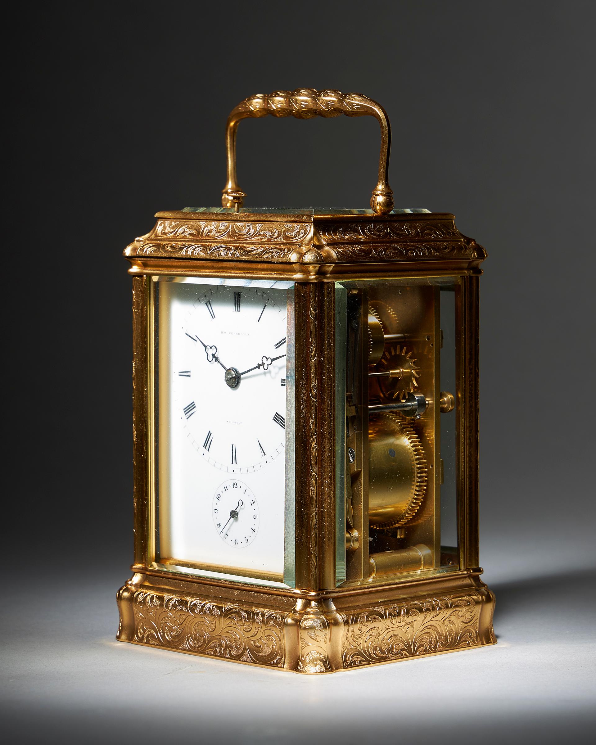 A superb high quality eight-day striking and repeating carriage clock, signed on the enamel dial PERREGAUX AU LOCLE, circa 1870.

The superb engraved gilt gorge brass case has facetted glass panels to all sides so that the movement is almost