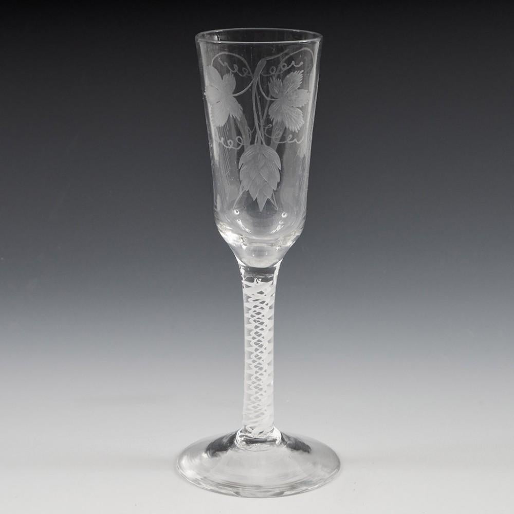 Engraved Georgian Opaque Twist Stem Ale Glass, c1760

Additional information: 
Period : George II - George III
Origin : England
Colour : Clear
Bowl : Round funnel. Engraved with ears of barley in saltire with prominent flag leaves, hop leaves, a