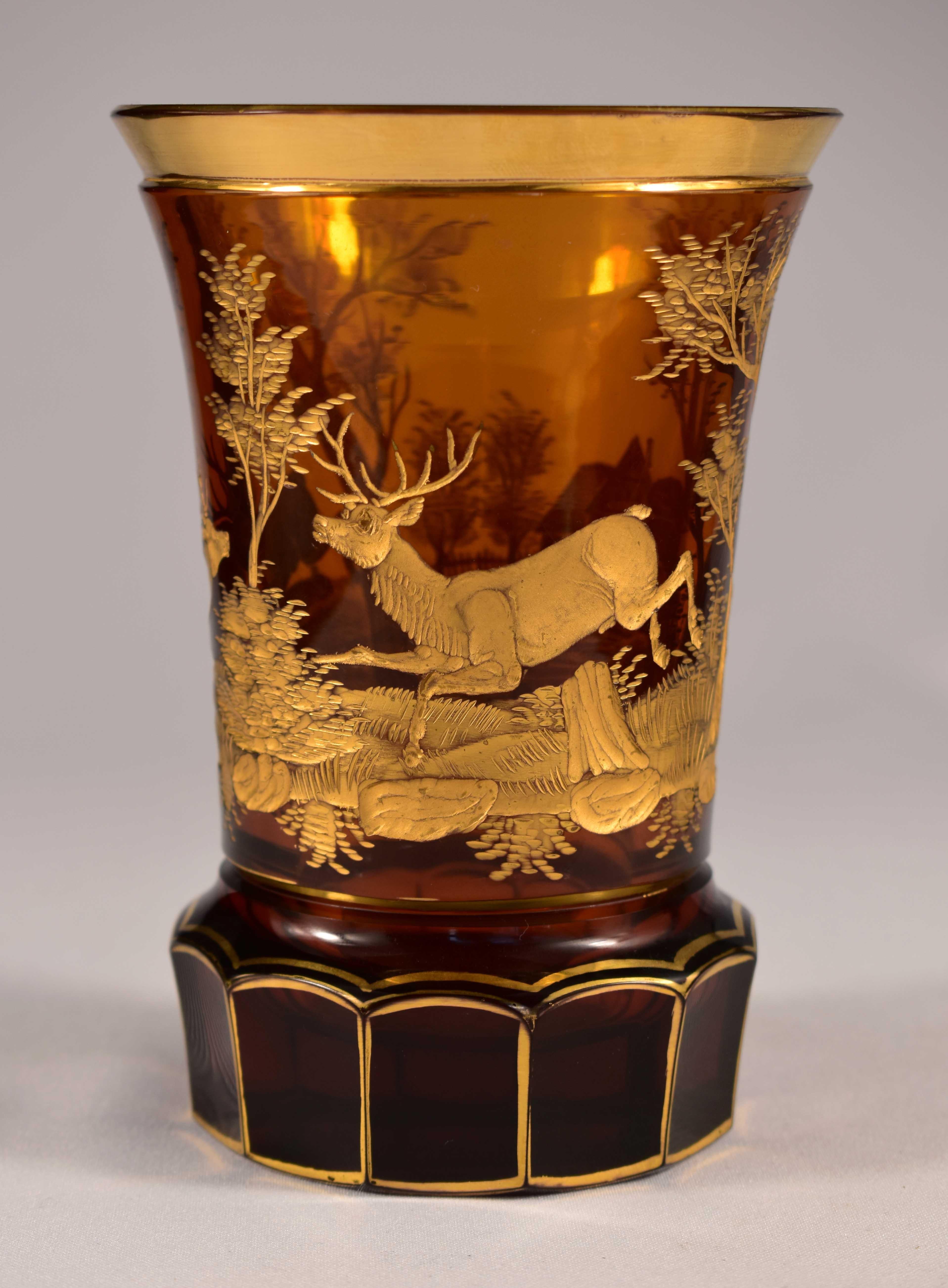 Beautiful goblet made of amber glass, gilded engraving with a hunting motif, 20th century Bohemian Glass- Undamaged