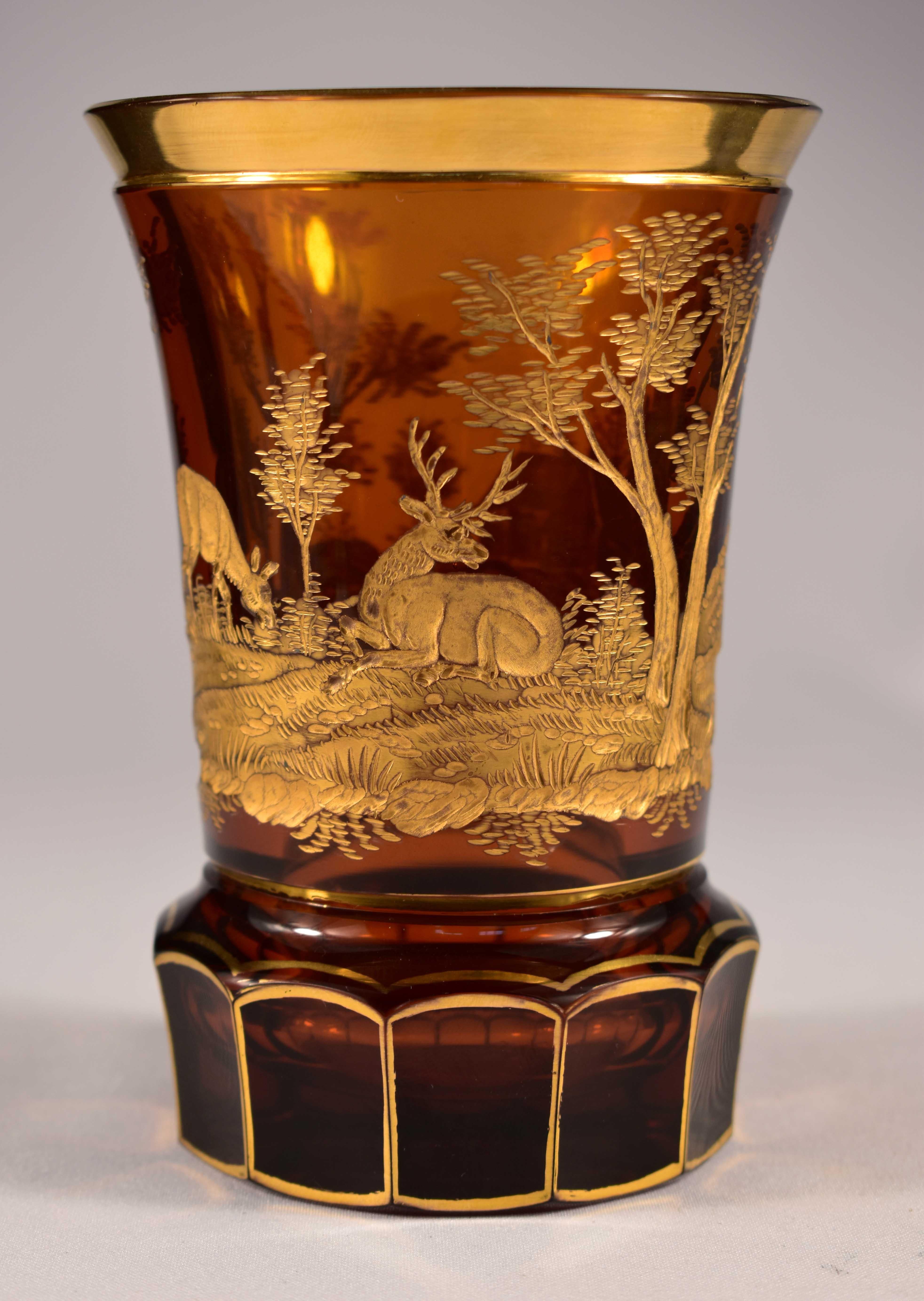 Beautiful goblet made of amber glass, gilded engraving with a hunting motif, 20th century Bohemian Glass- Undamaged.