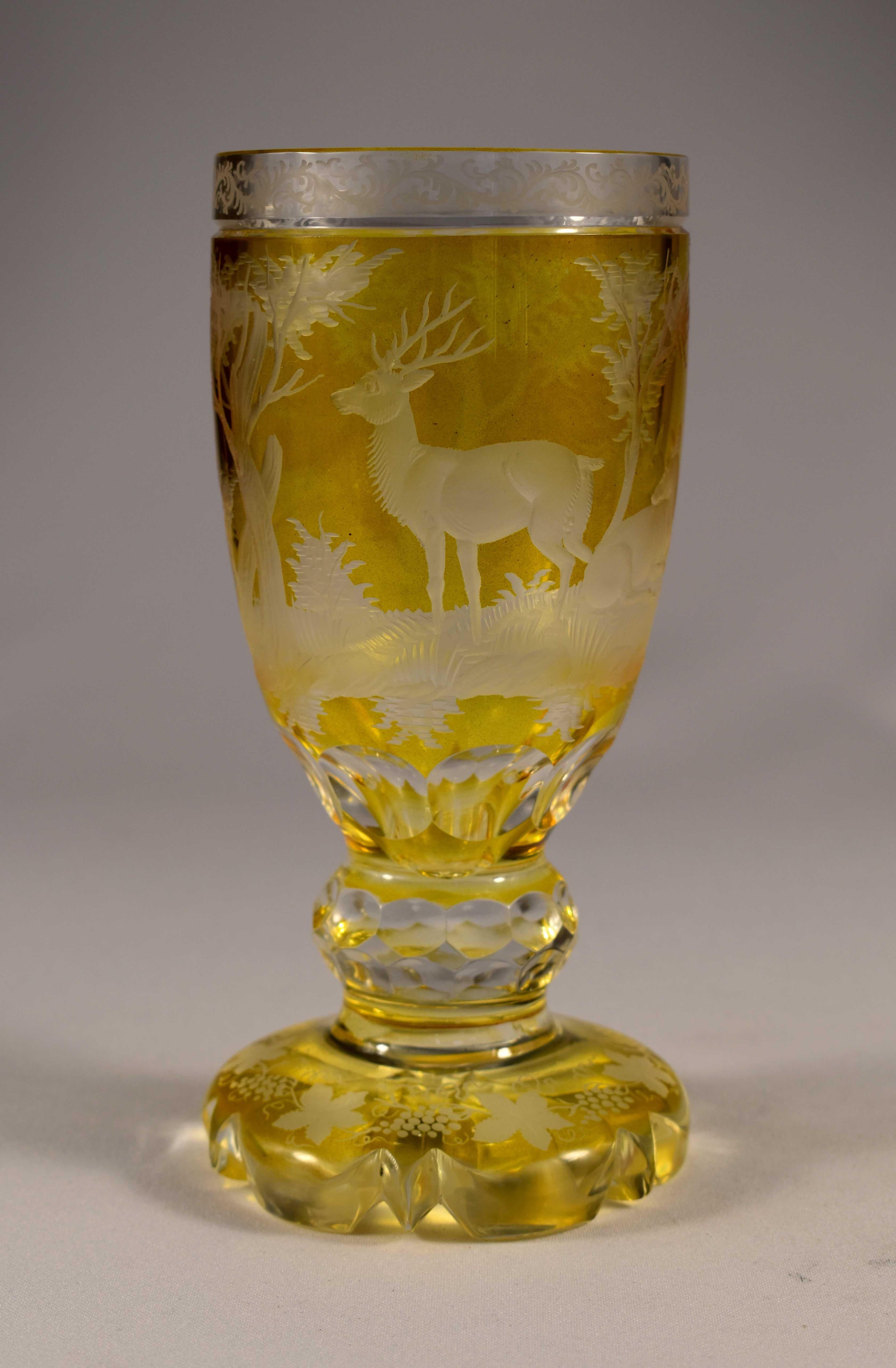 Beautiful cut and engraved cup, overlaid yellow lazura, engraved hunting motif, 20th century Bohemian glass.