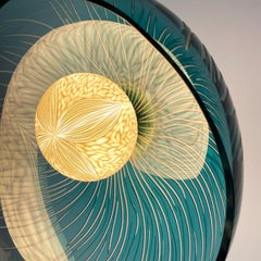Engraved medium blue blown glass, porcelain and brass sconce by Vezzini & Chen