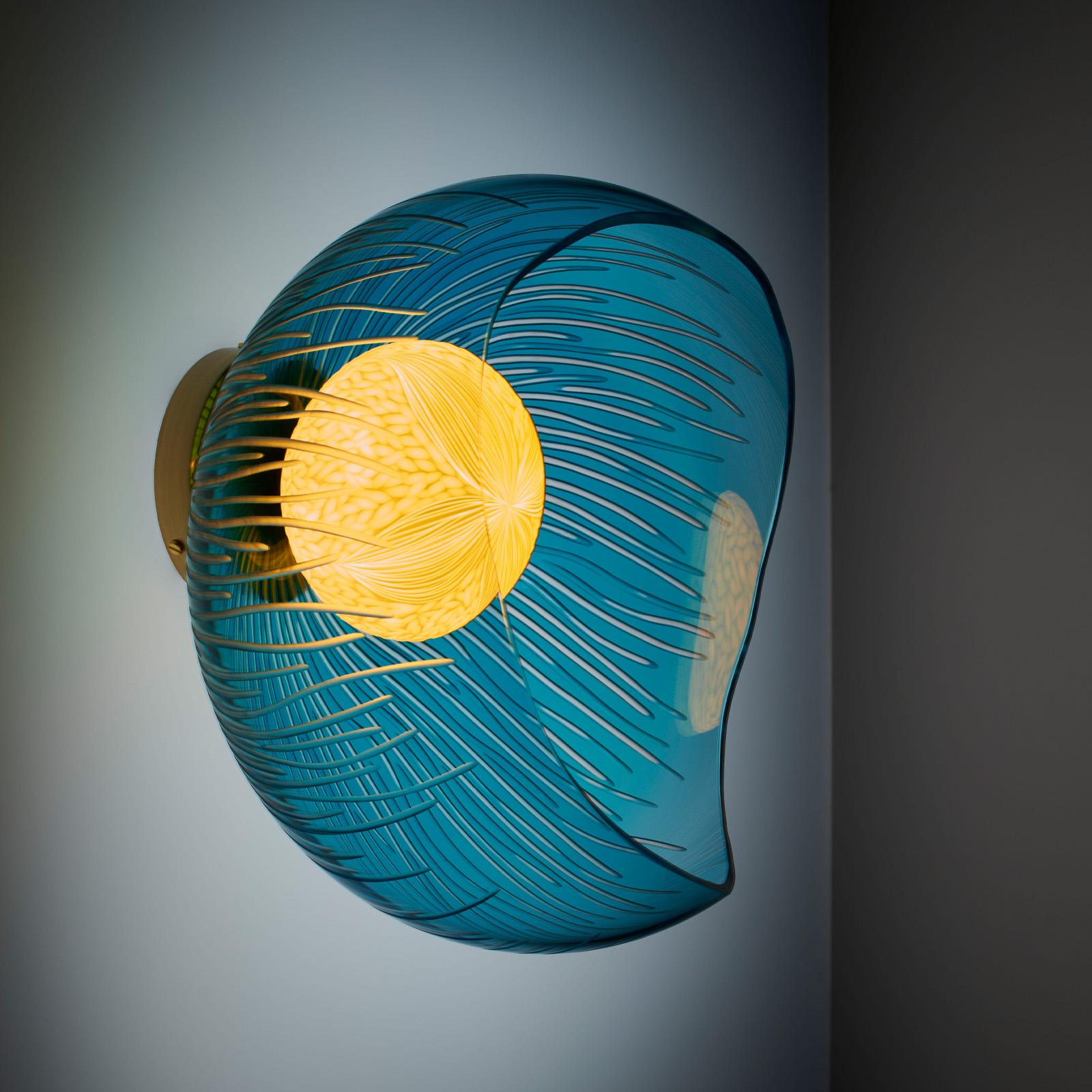 Hand-Carved Engraved medium blue blown glass, porcelain and brass sconce by Vezzini & Chen For Sale